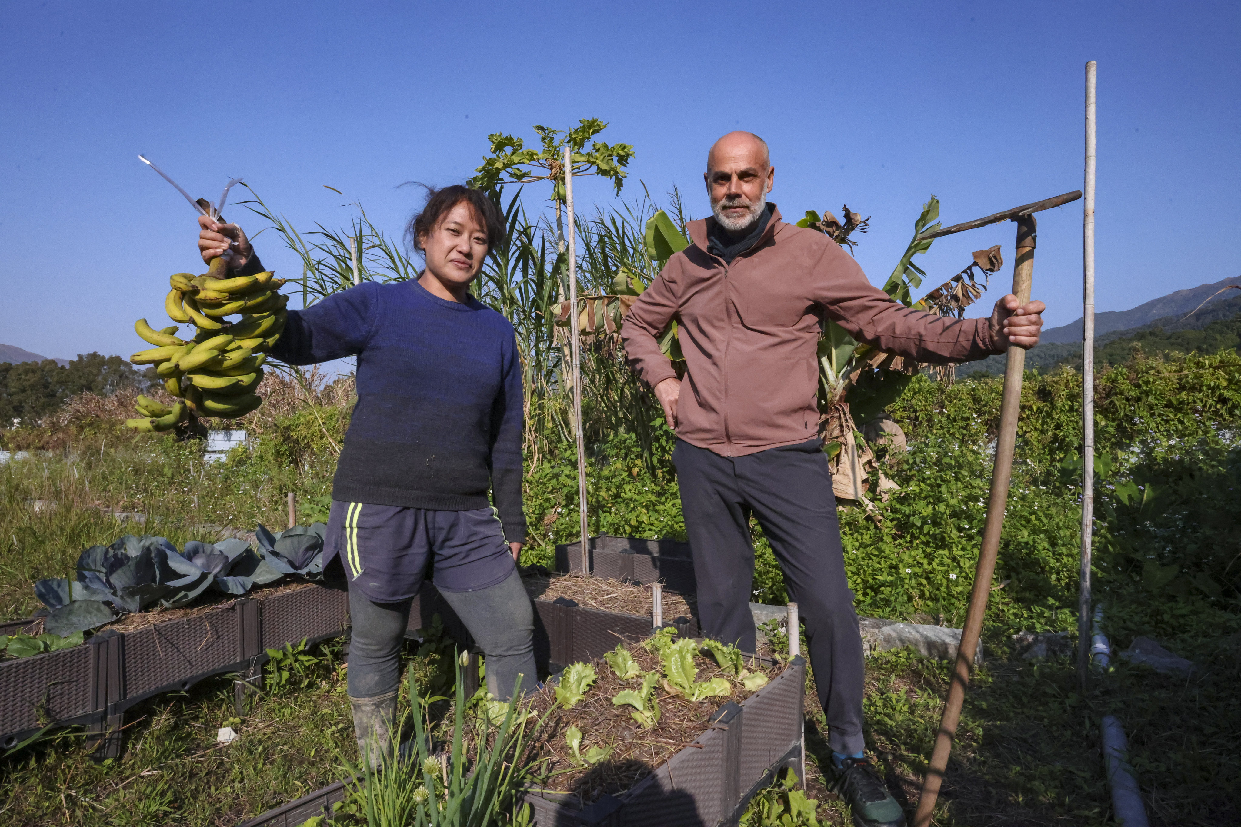 Farmer-artists Natalie Lo and Laurent Gutierrez at the SangWood KidsClub farm in Shek Kong, Hong Kong. Photo: Jonathan Wong