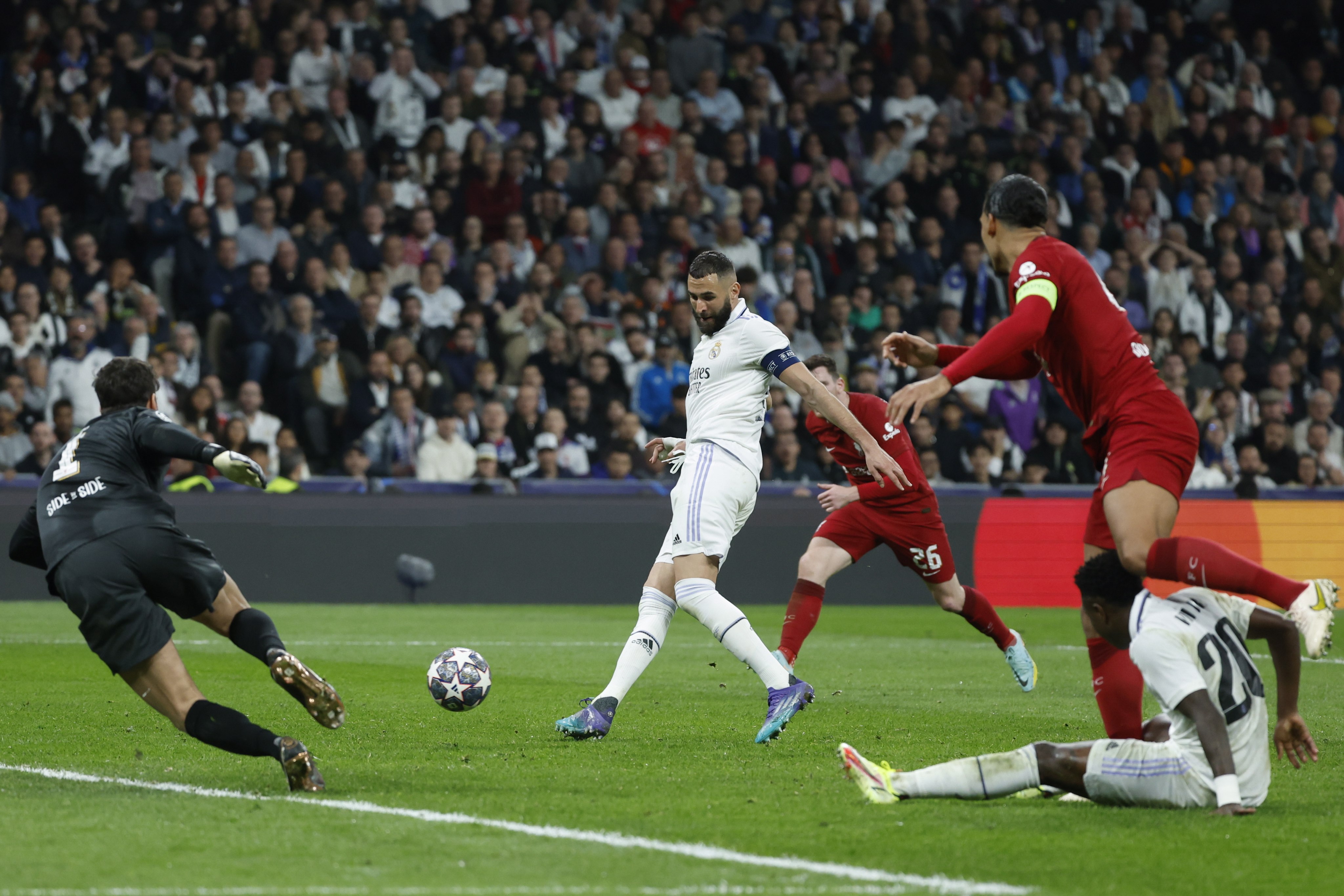 Real Madrid’s Karim Benzema scores the only goal of the night against Liverpool. Photo: EPA-EFE