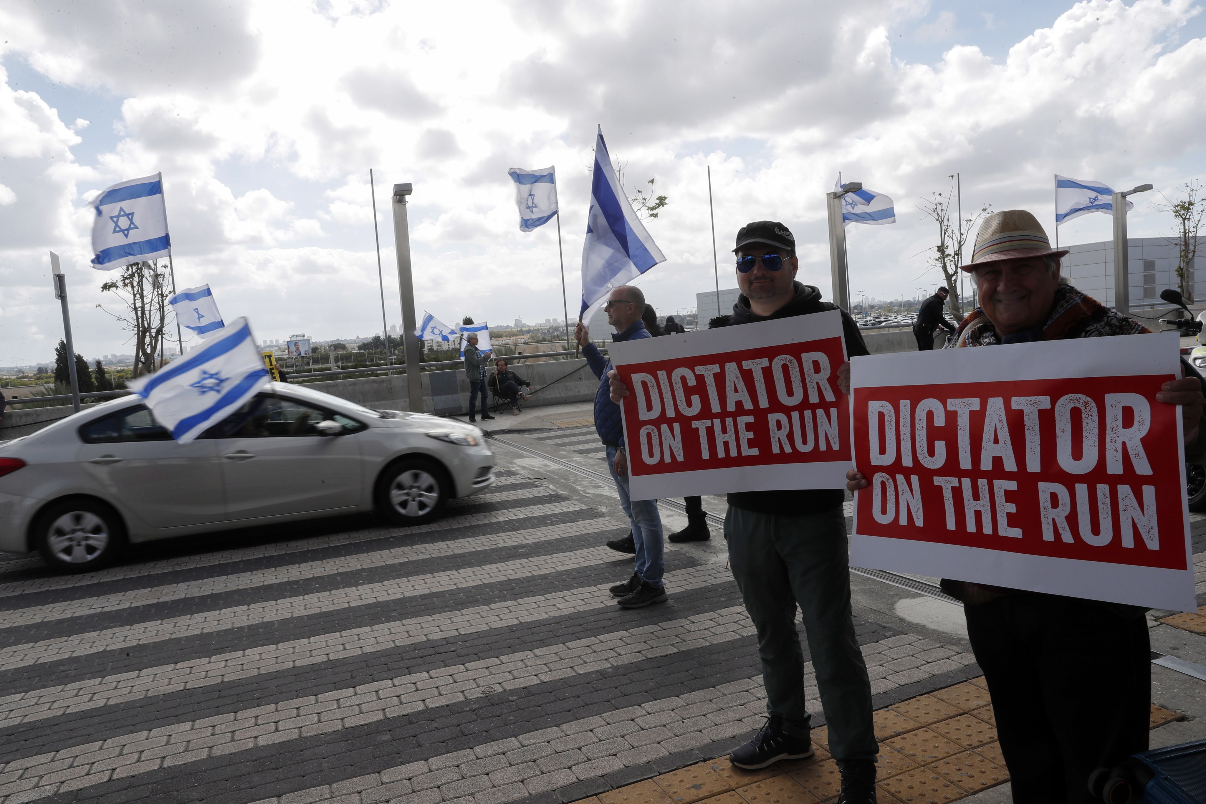 Israelis take part during an anti-government protest at Ben Gurion Airport, ahead of Prime Minister Benjamin Netanyahu’s flight to Germany on Wednesday. Photo: EPA-EFE