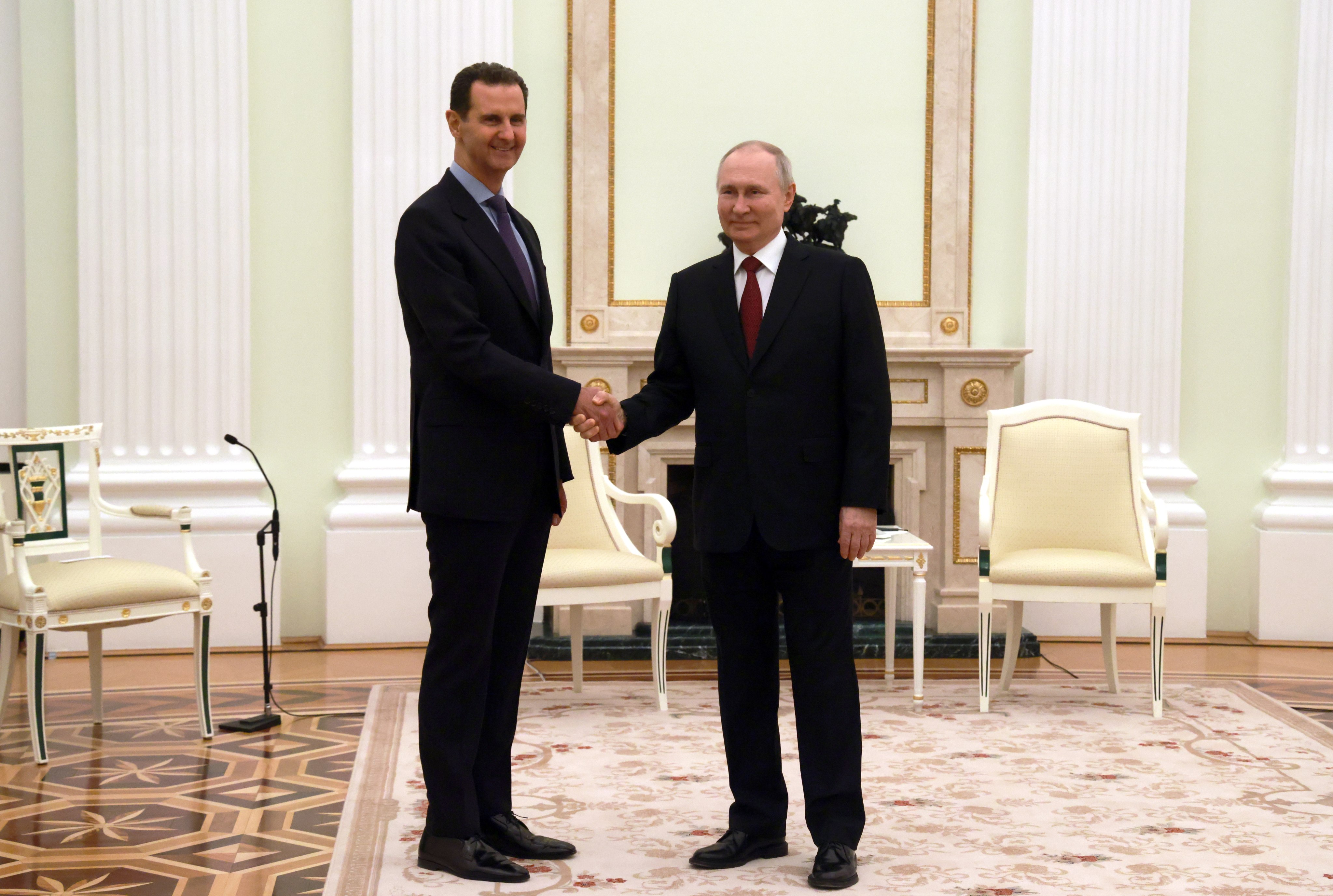 Russian President Vladimir Putin, right, and Syrian President Bashar al-Assad during their meeting at the Kremlin in Moscow, Russia on Wednesday. Photo: Vladimir Gerdo / Sputnik / Kremlin / EPA-EFE