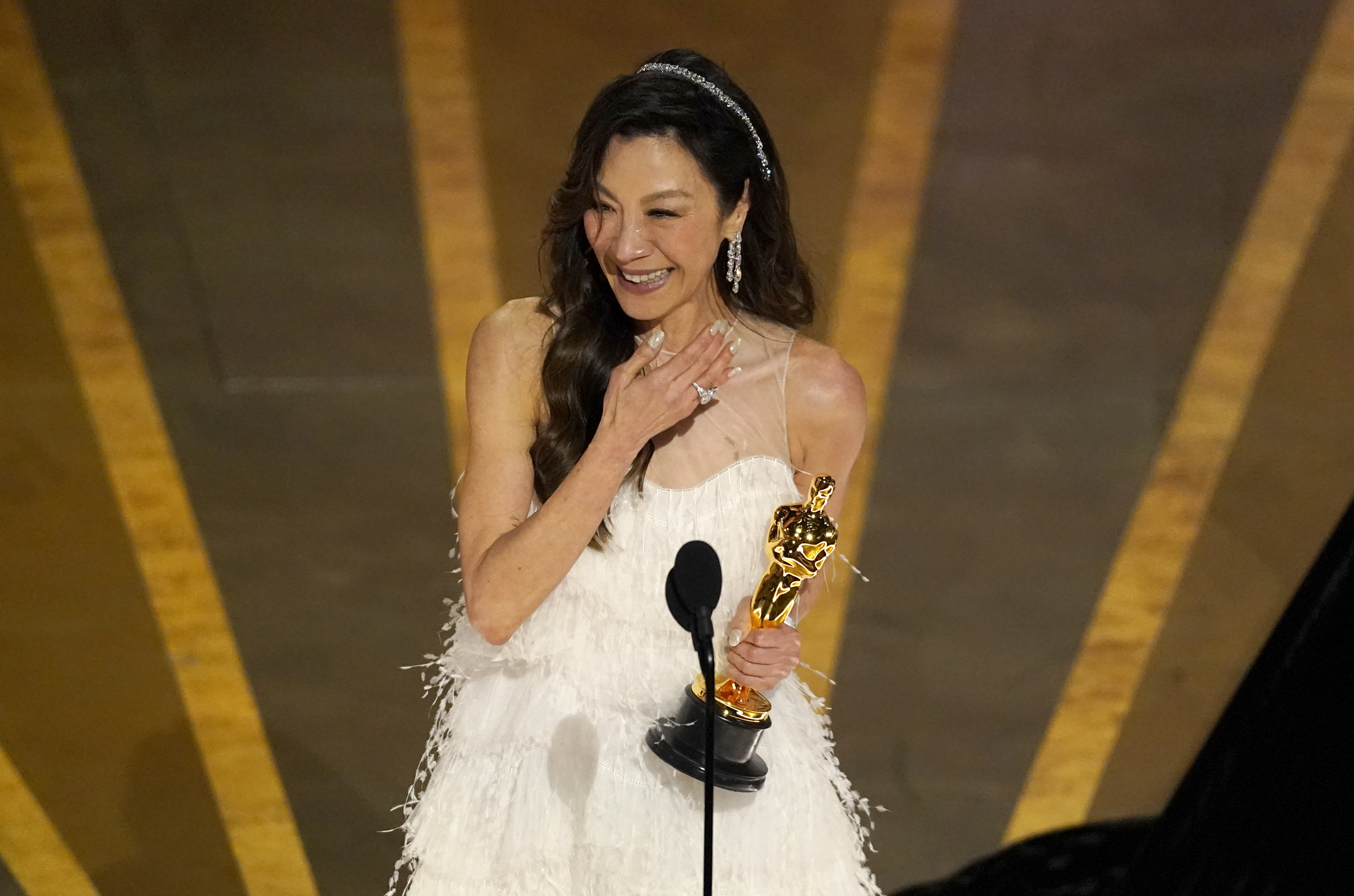 Michelle Yeoh accepts the award for best performance by an actress in a leading role for Everything Everywhere All at Once at the Oscars on March 12, at the Dolby Theatre in Los Angeles. Photo: AP