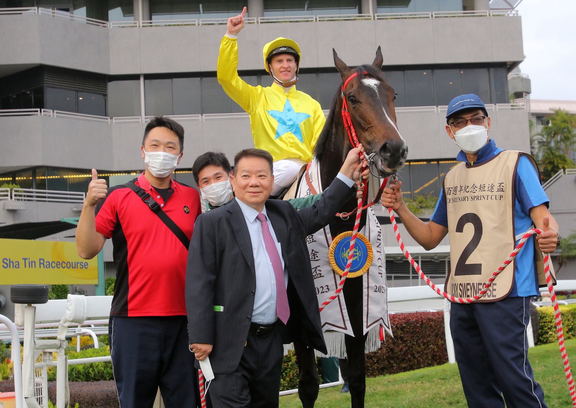 Trainer Manfred Man and jockey Zac Purton celebrate Lucky Sweynesse’s Centenary Sprint Cup victory.