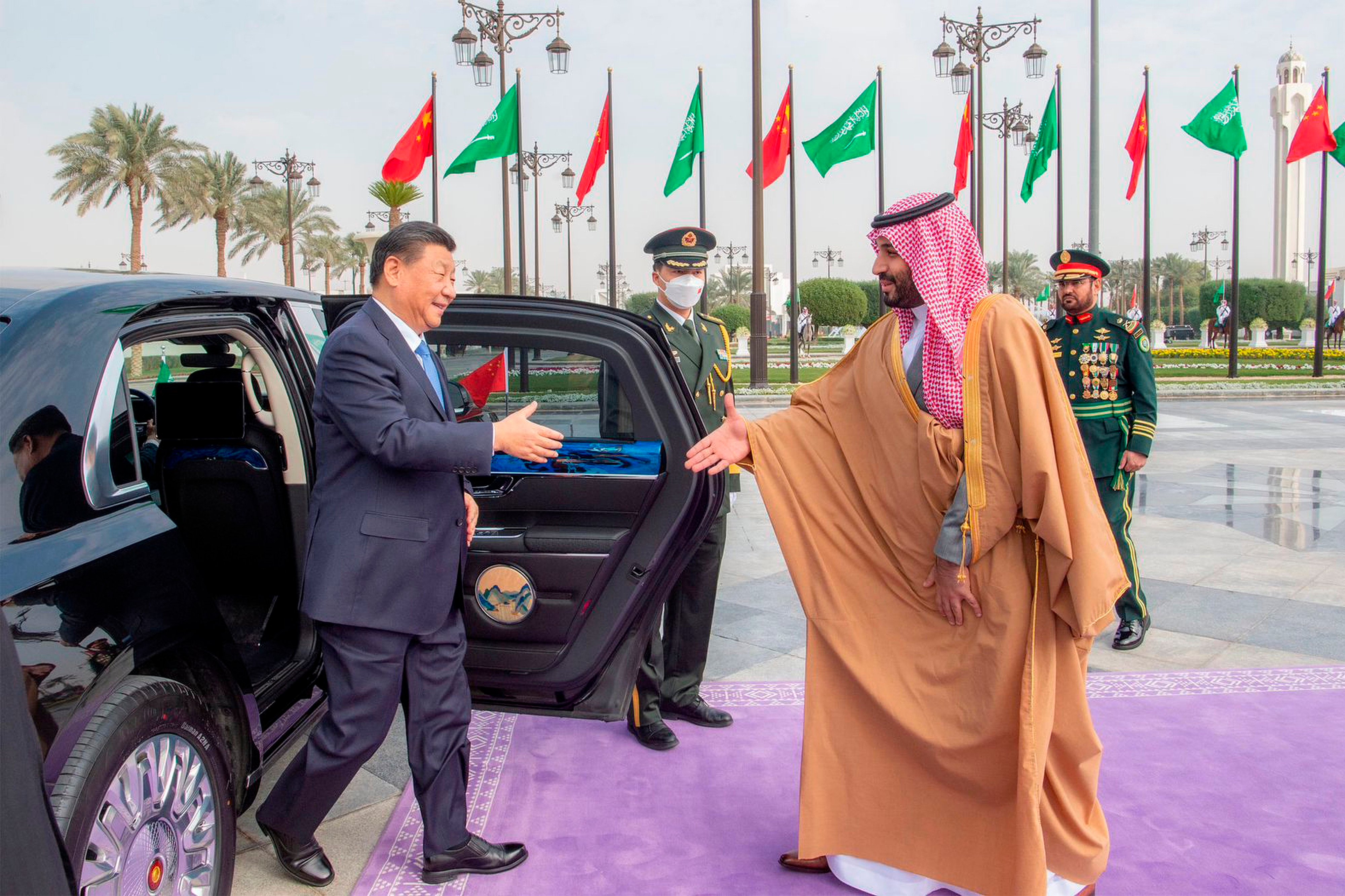 President Xi Jinping is greeted by Saudi Crown Prince Mohammed bin Salman after his arrival in Riyadh on December 8, 2022. China’s recent rise in engagement with the Middle East is part of a larger diplomatic push to portray itself as a force for peace. Photo: Saudi Press Agency via AP