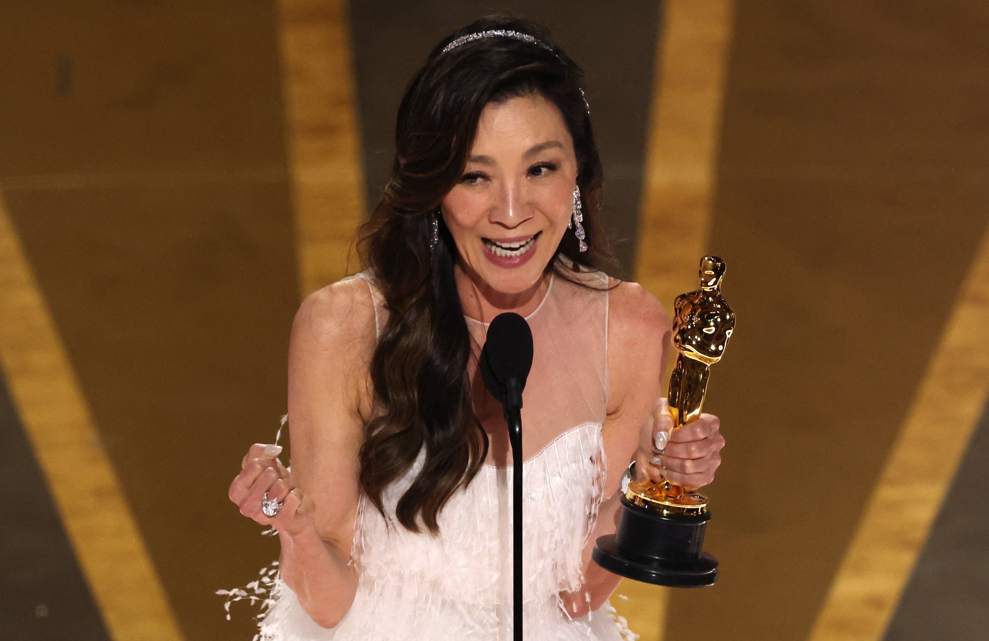 Michelle Yeoh accepts the Oscar for best actress on March 12. Photo: Reuters