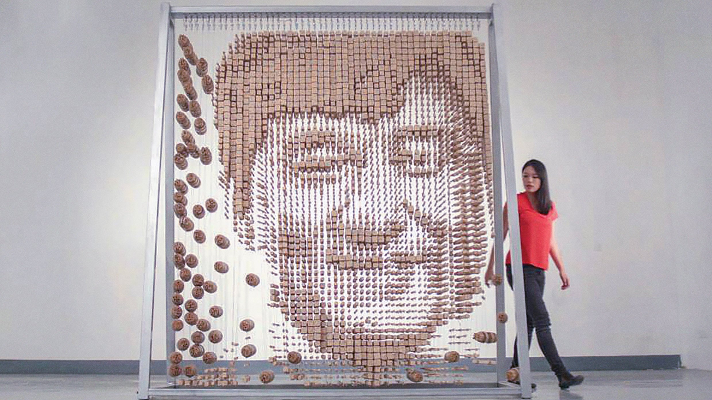 Red Hong Yi’s portrait of Jackie Chan was created from 
64,000 bamboo chopsticks. Photo: Red Hong Yi