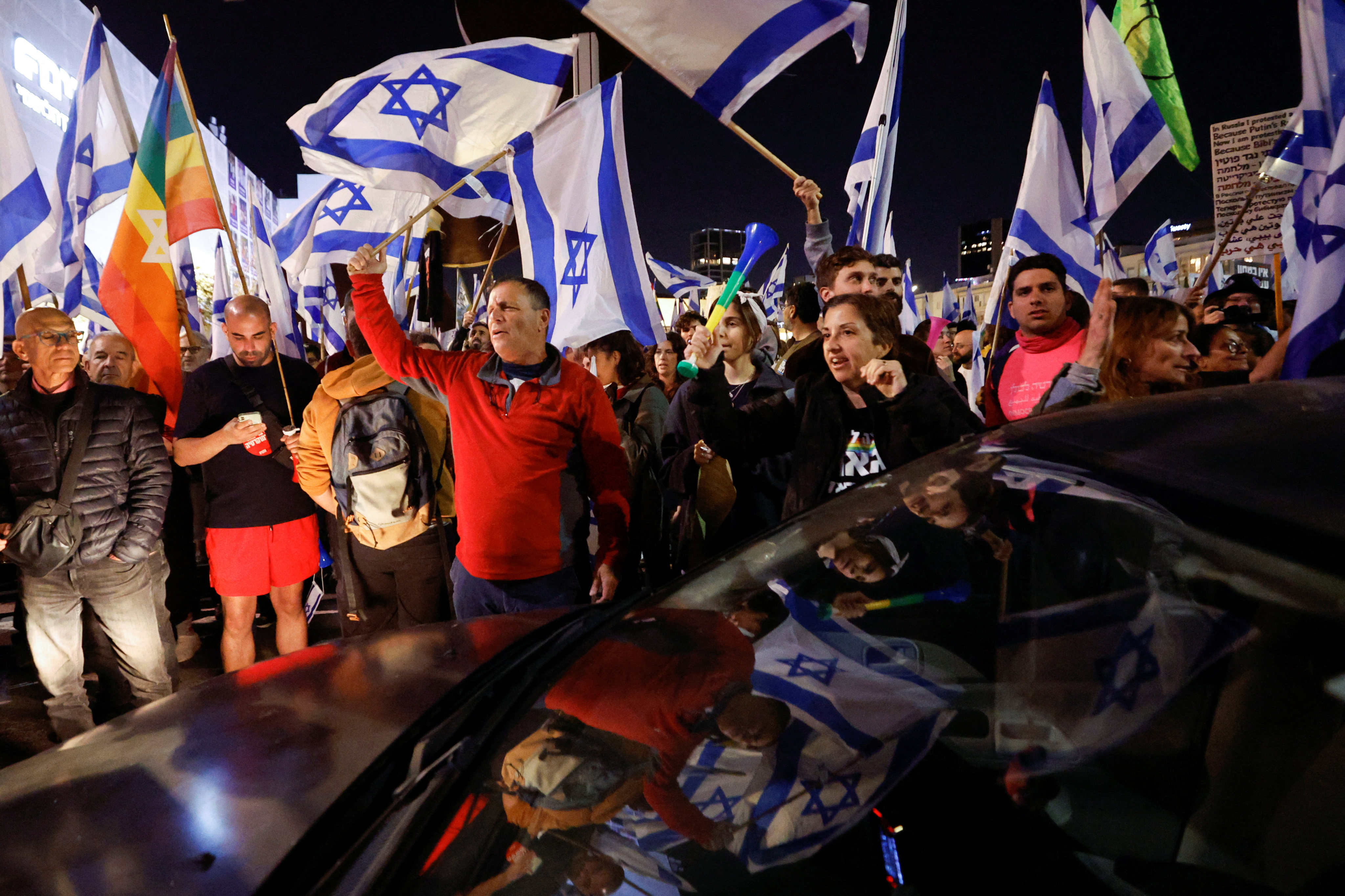 Israelis protest in Tel Aviv, Israel on Thursday as Prime Minister Benjamin Netanyahu’s nationalist coalition government presses on with its contentious judicial overhaul. Photo: Reuters