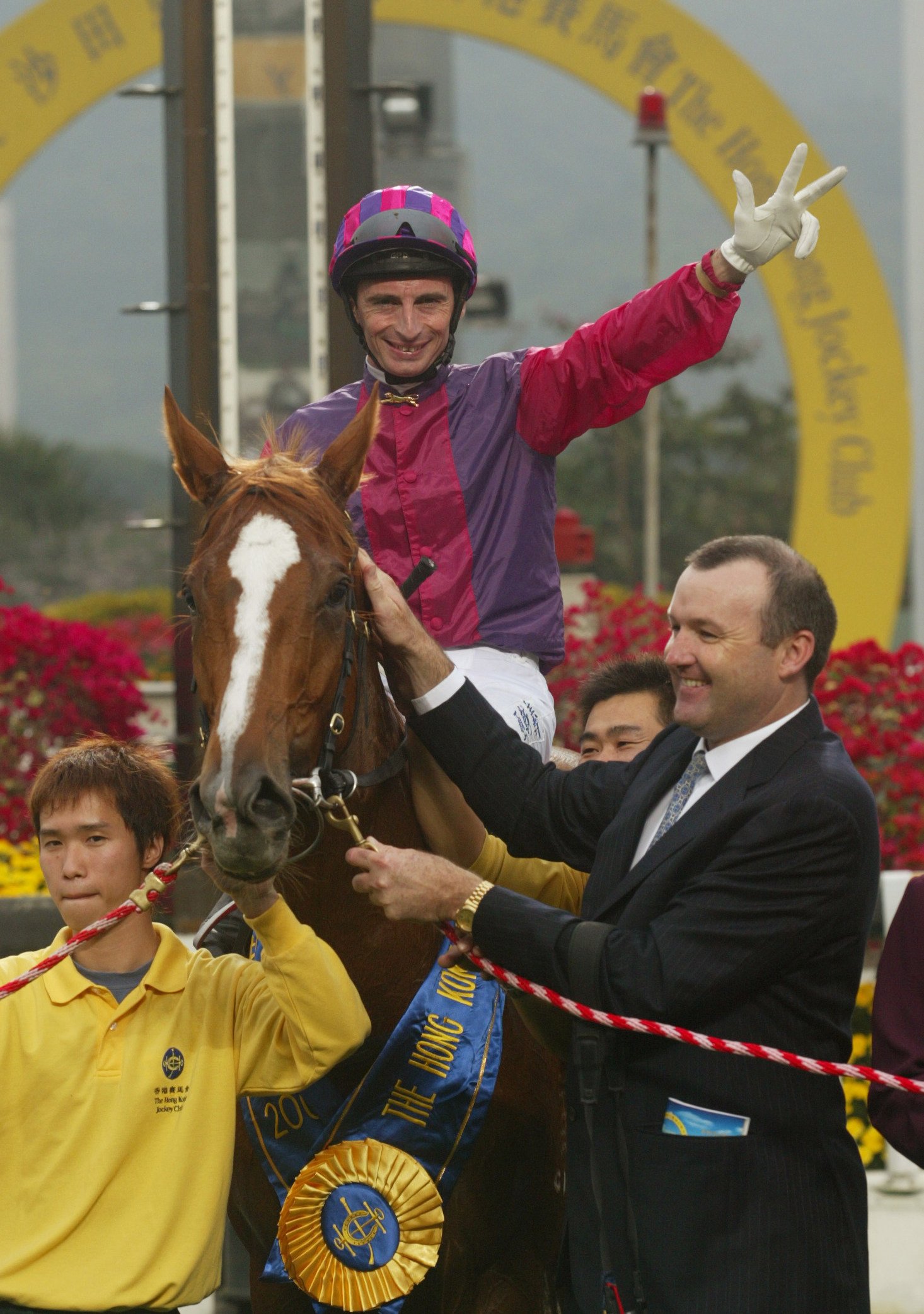 Gerald Mosse and David Hayes celebrate Elegant Fashion’s 2003 Hong Kong Derby victory. Photo: Kenneth Chan