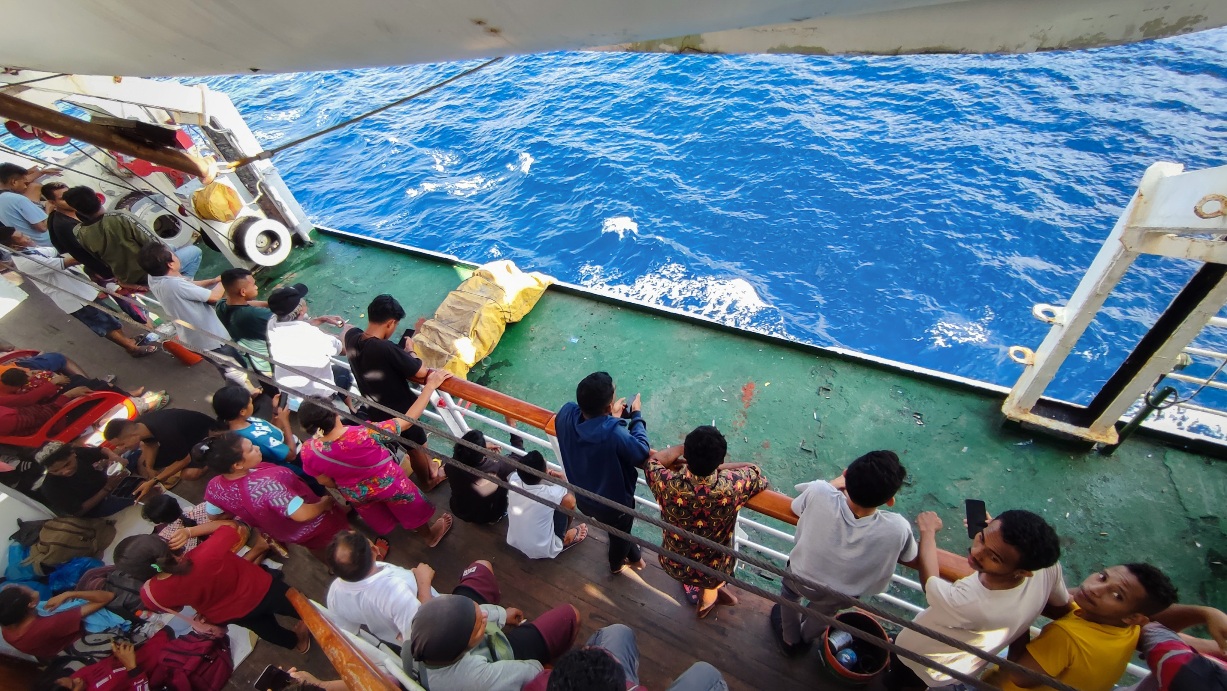Passengers on the deck of the Kapal Awu. Photo: Chan Kit Yeng