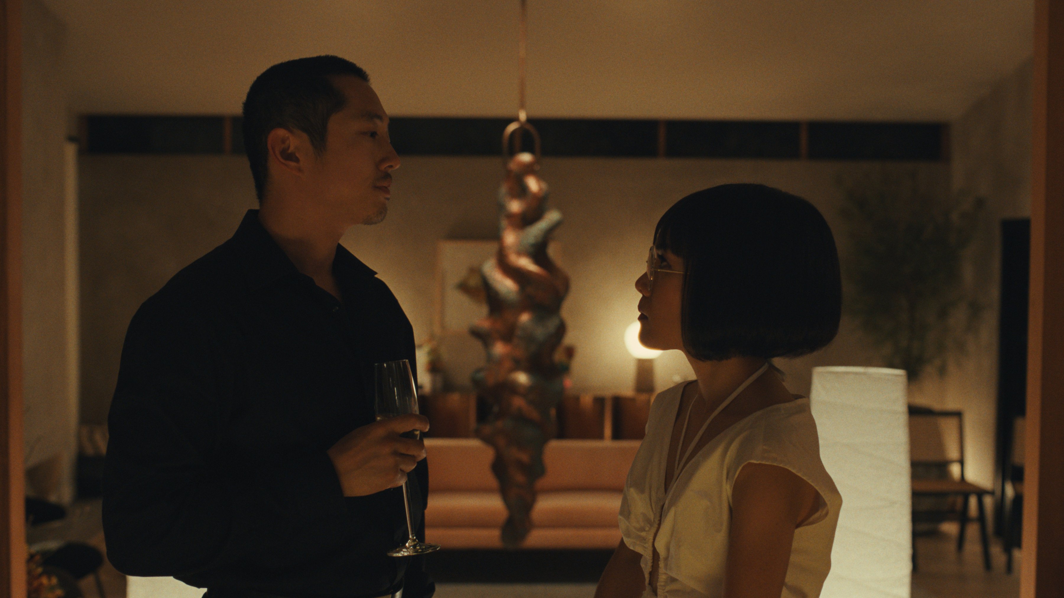 Steven Yeun (left) as Danny and Ali Wong as Amy in a still from Beef. Photo: Netflix