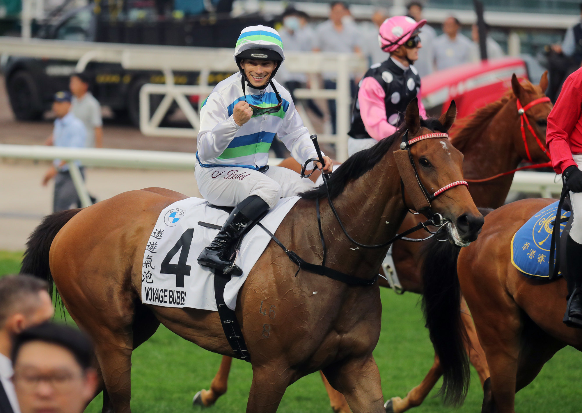 A jubilant Alexis Badel pumps his fist after winning the Hong Kong Derby.