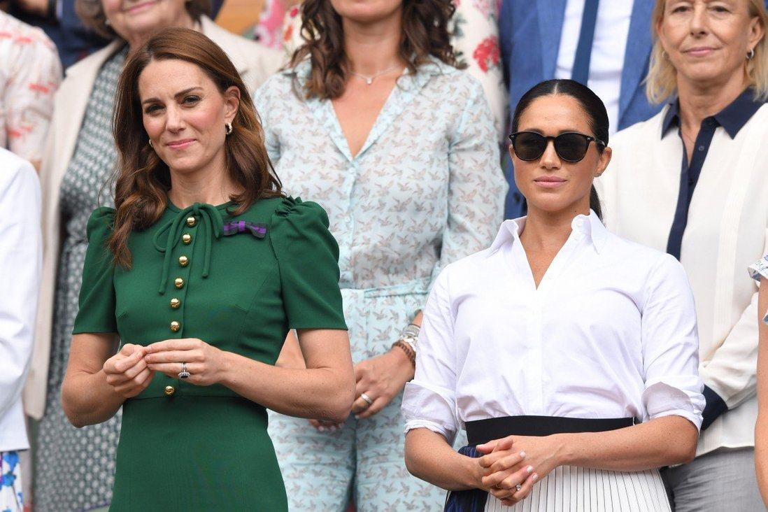 Kate Middleton and Meghan Markle at Wimbledon in 2019 – while Middleton must continue to adhere to royal fashion protocol in public, Markle can now wear what she likes. Photo: Getty Images