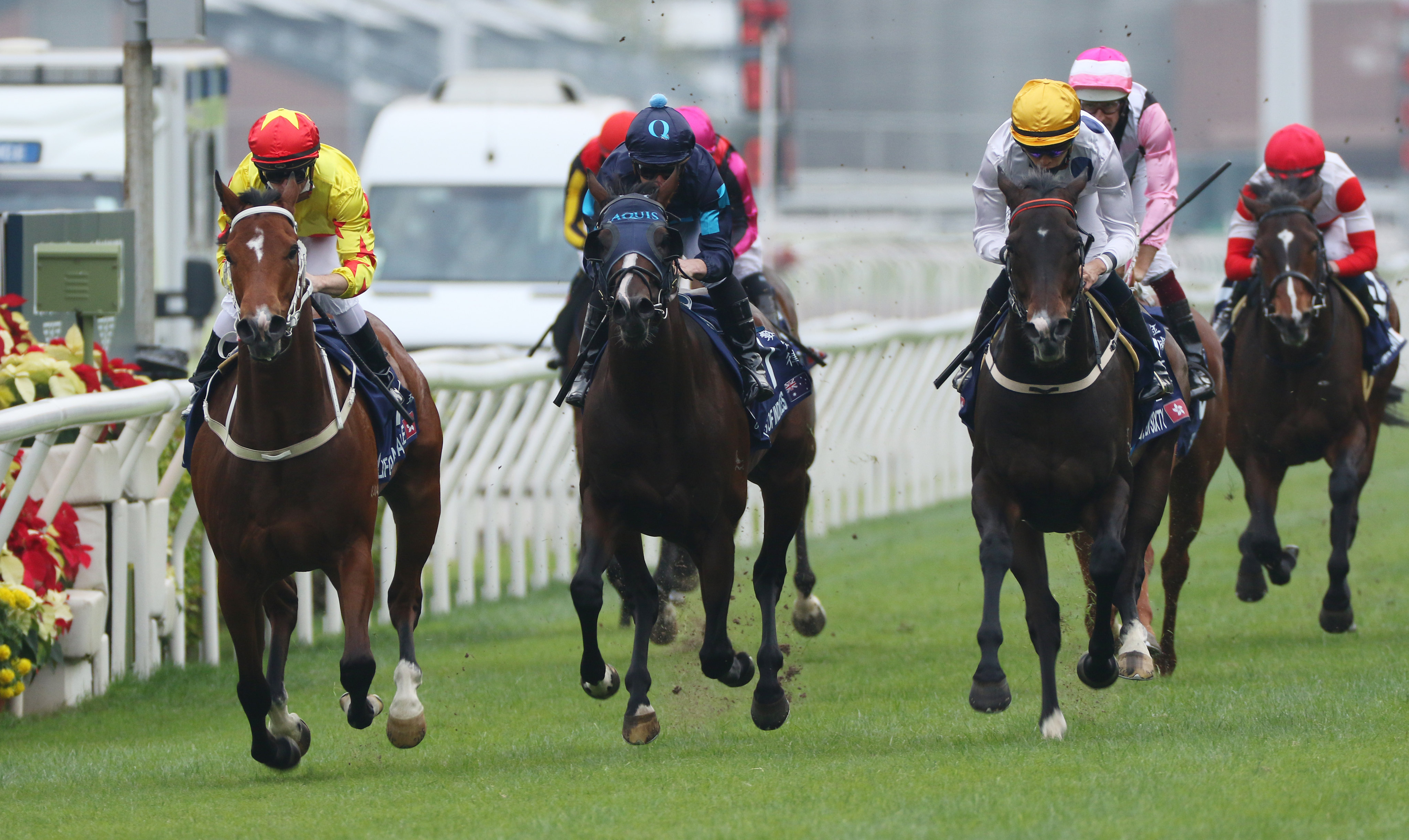 California Spangle (left) defeats Golden Sixty (right) and Laws Of Indices (middle) to win December’s Hong Kong Mile. Photo: Kenneth Chan