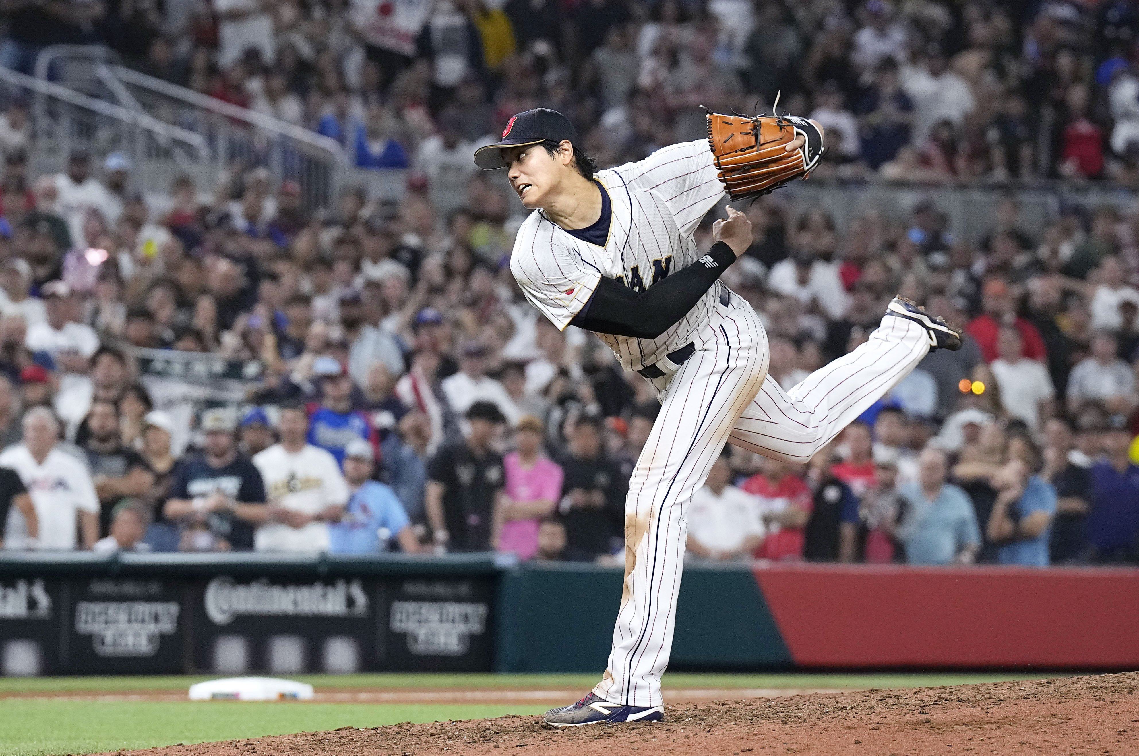 Japan’s Shohei Ohtani makes a relief appearance in the ninth inning of the World Baseball Classic final against the United States at loanDepot park in Miami, Florida, on March 21, 2023. Ohtani got the final three outs, sealing Japan’s 3-2 win. Photo: Kyodo