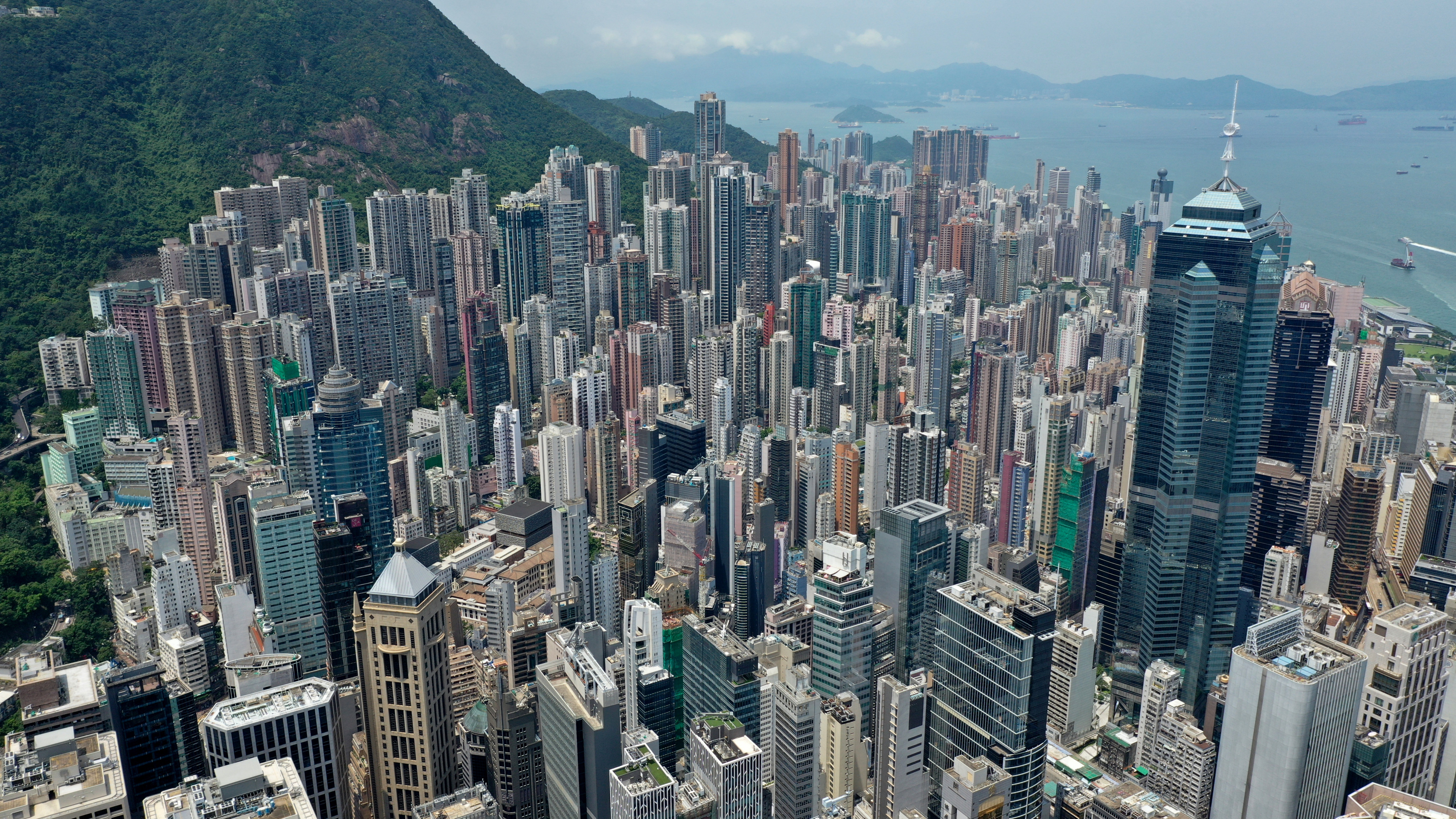 New policy measures are formulated to showcase “the full charm of Hong Kong”, says financial services chief Christopher Hui Ching-yu. Photo: Roy Issa