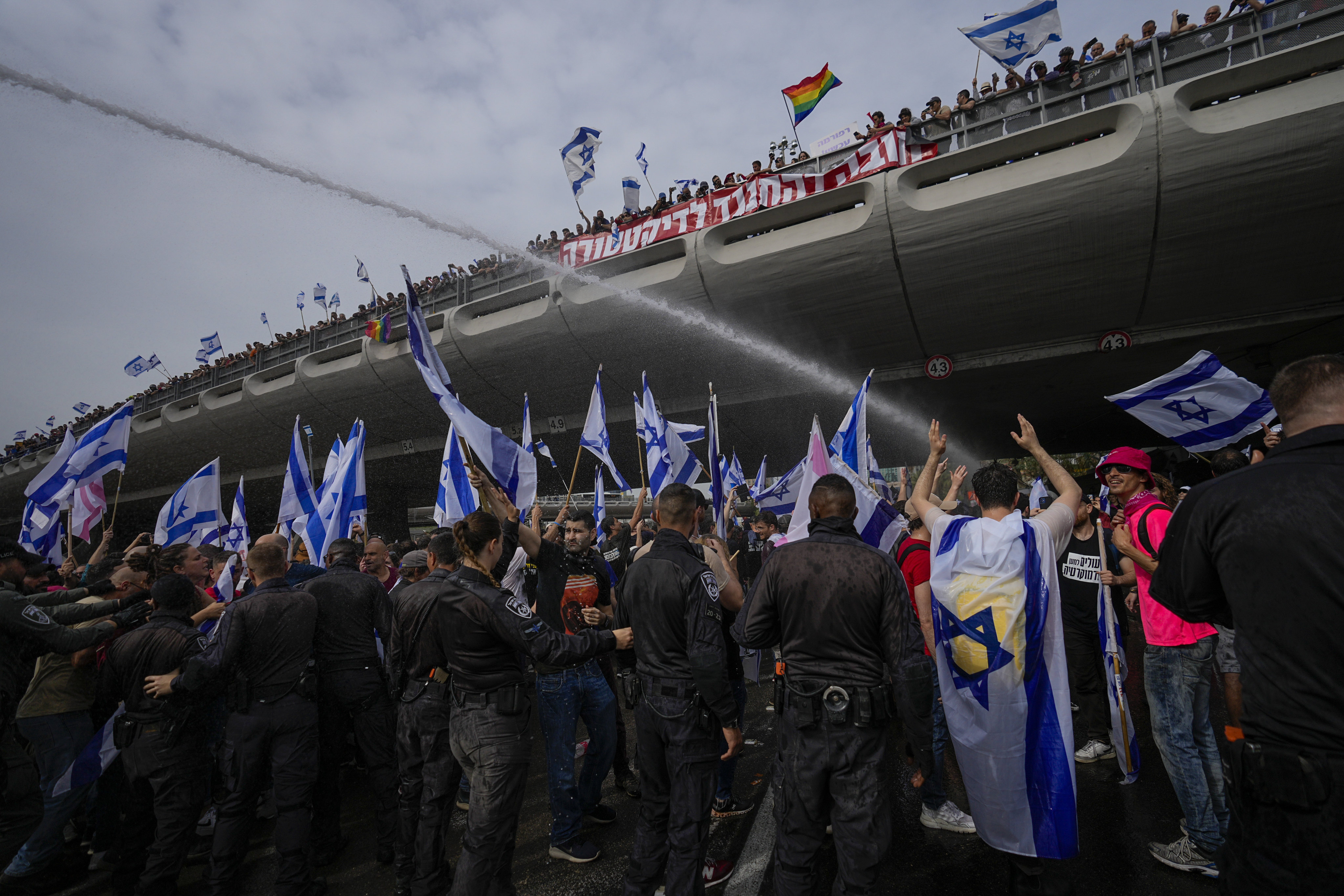 Israeli police use water cannon to disperse protesters in Tel Aviv, Israel. Photo: AP