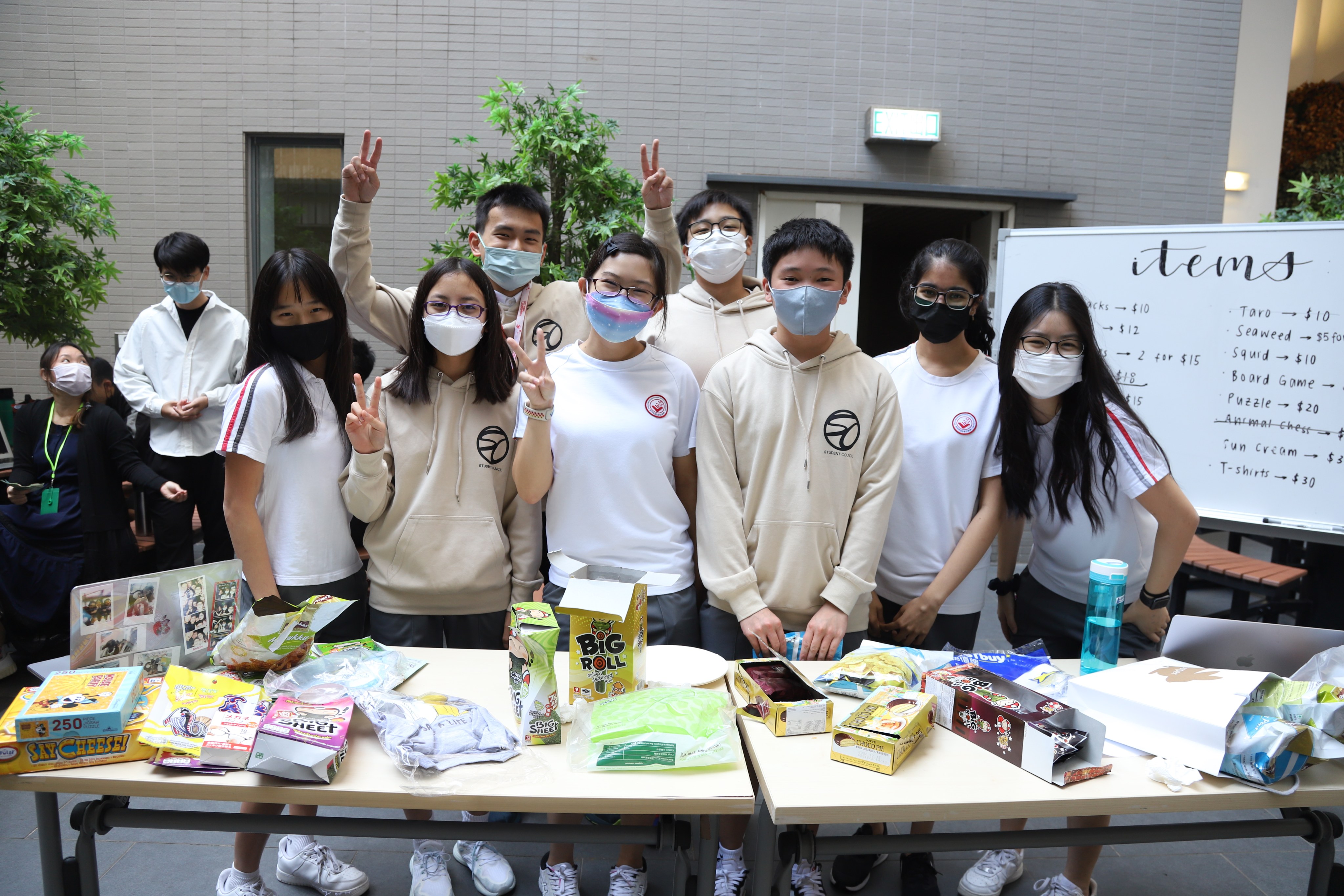 Alexander Yeu (back left) in and Grace Chan (front, third from left) are co-presidents of the student council at Singapore International School Hong Kong. Photo: Handout