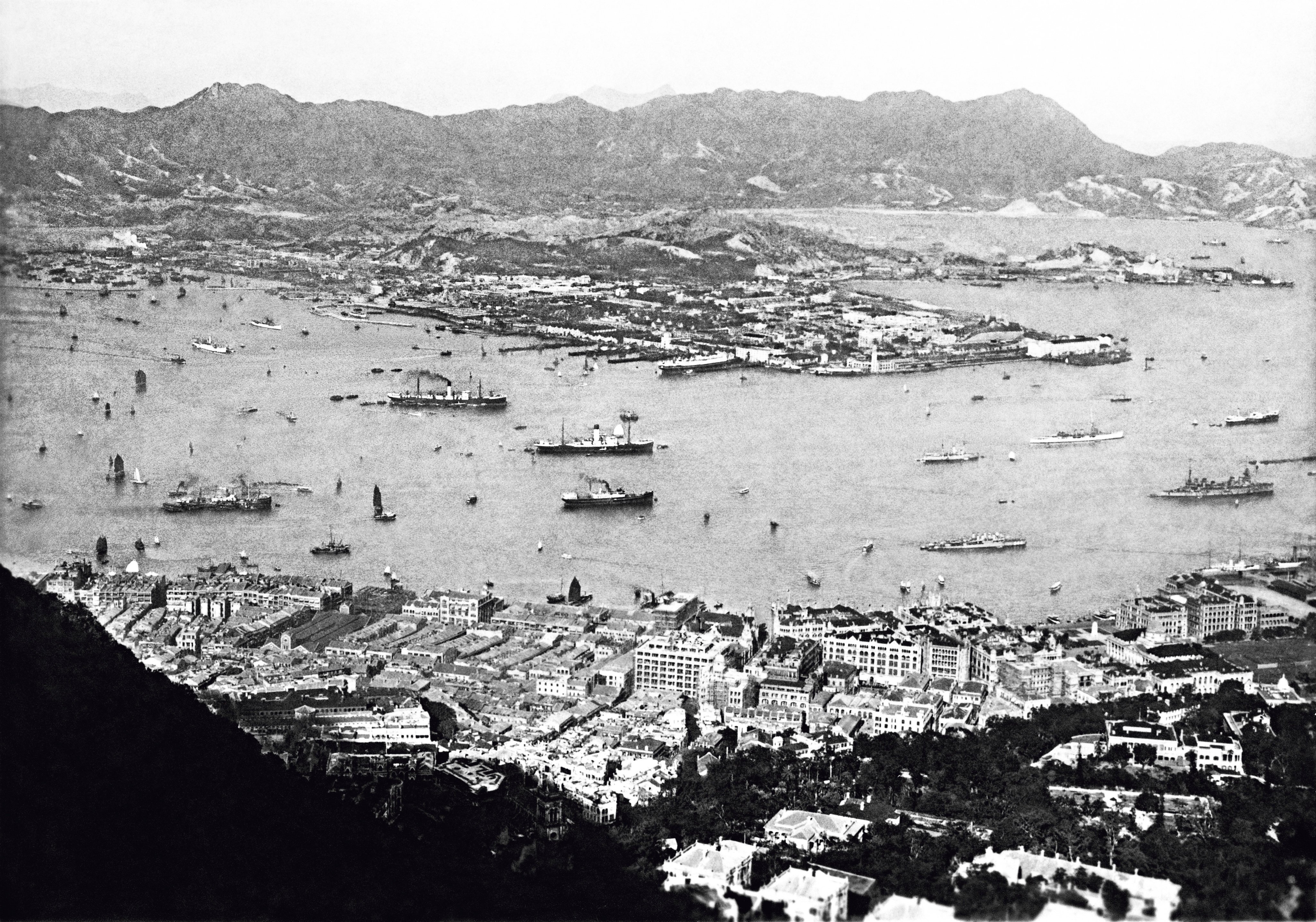 A 1920s aerial view of Hong Kong, with Western District in the foreground and the Kowloon peninsula and hills in the background. Australian William Farmer Whyte sailed into Victoria Harbour for a two-day visit in 1923, recorded in his travelogue. Photo: The University of Hong Kong Libraries