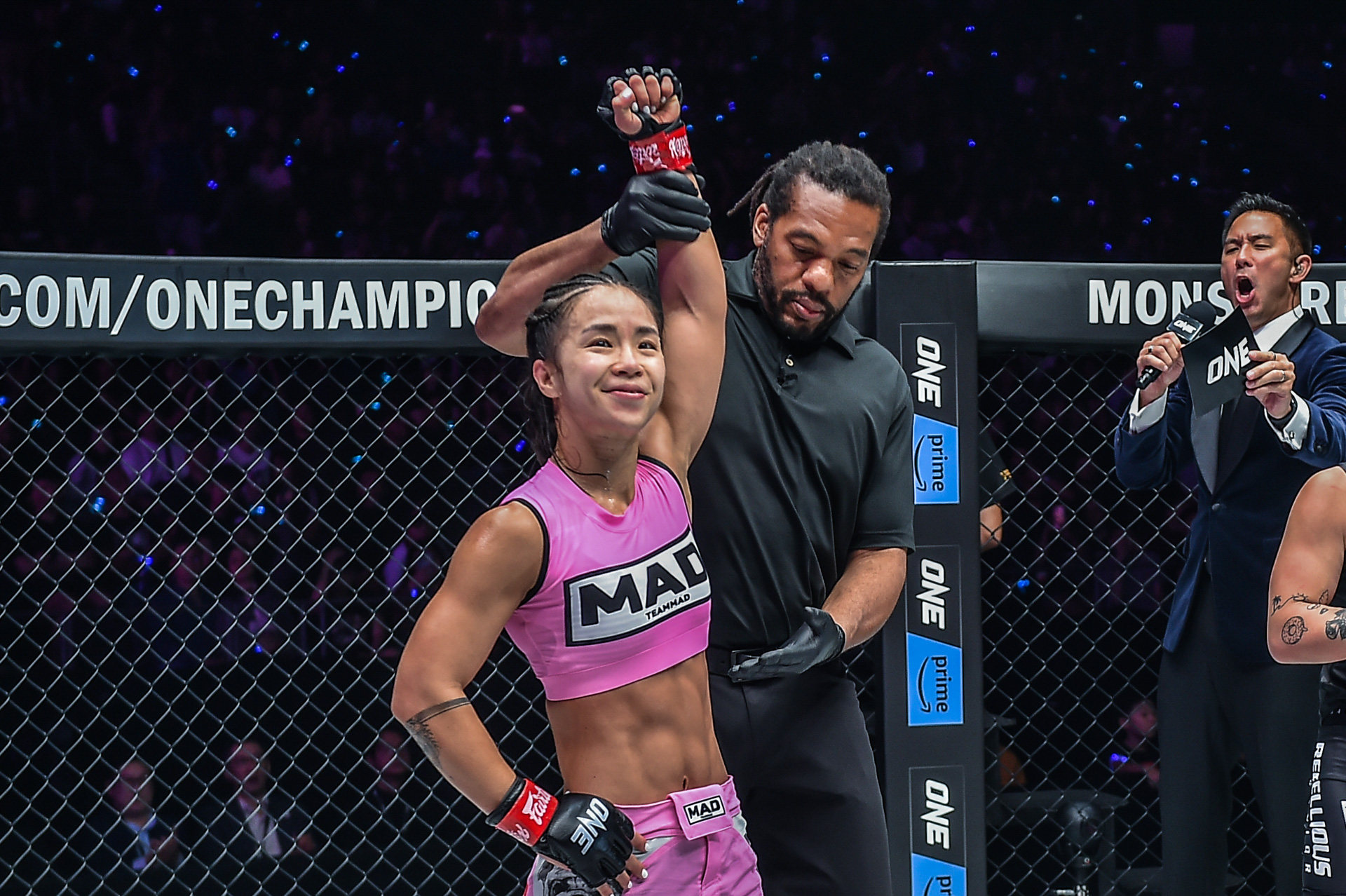 Referee Herb Dean raises Ham Seo-hee’s hand after her decision win over Itsuki Hirata at Fight Night 8 in Singapore. Photo: ONE Championship