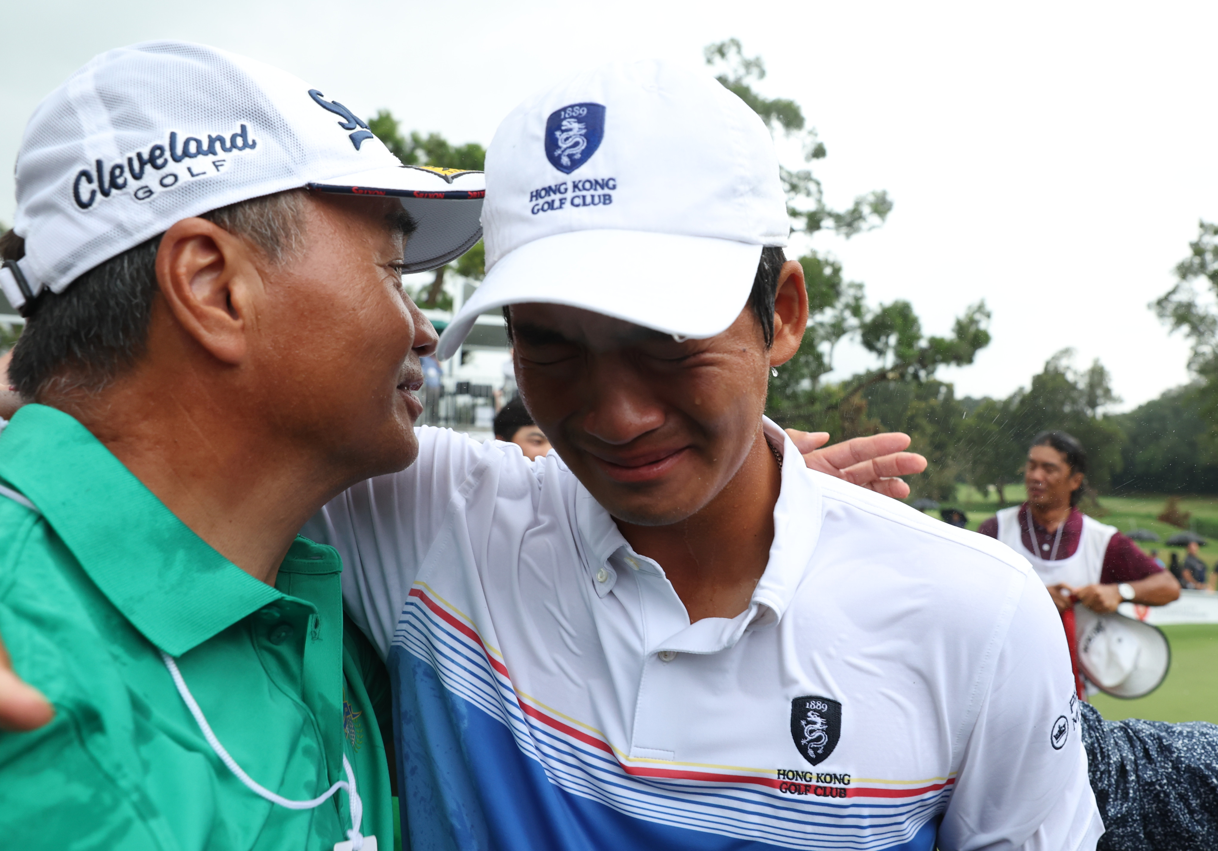 Taichi Kho of Hong Kong (right) embraces his father Victor after winning the World City Championship. Photo: Yik Yeung-man