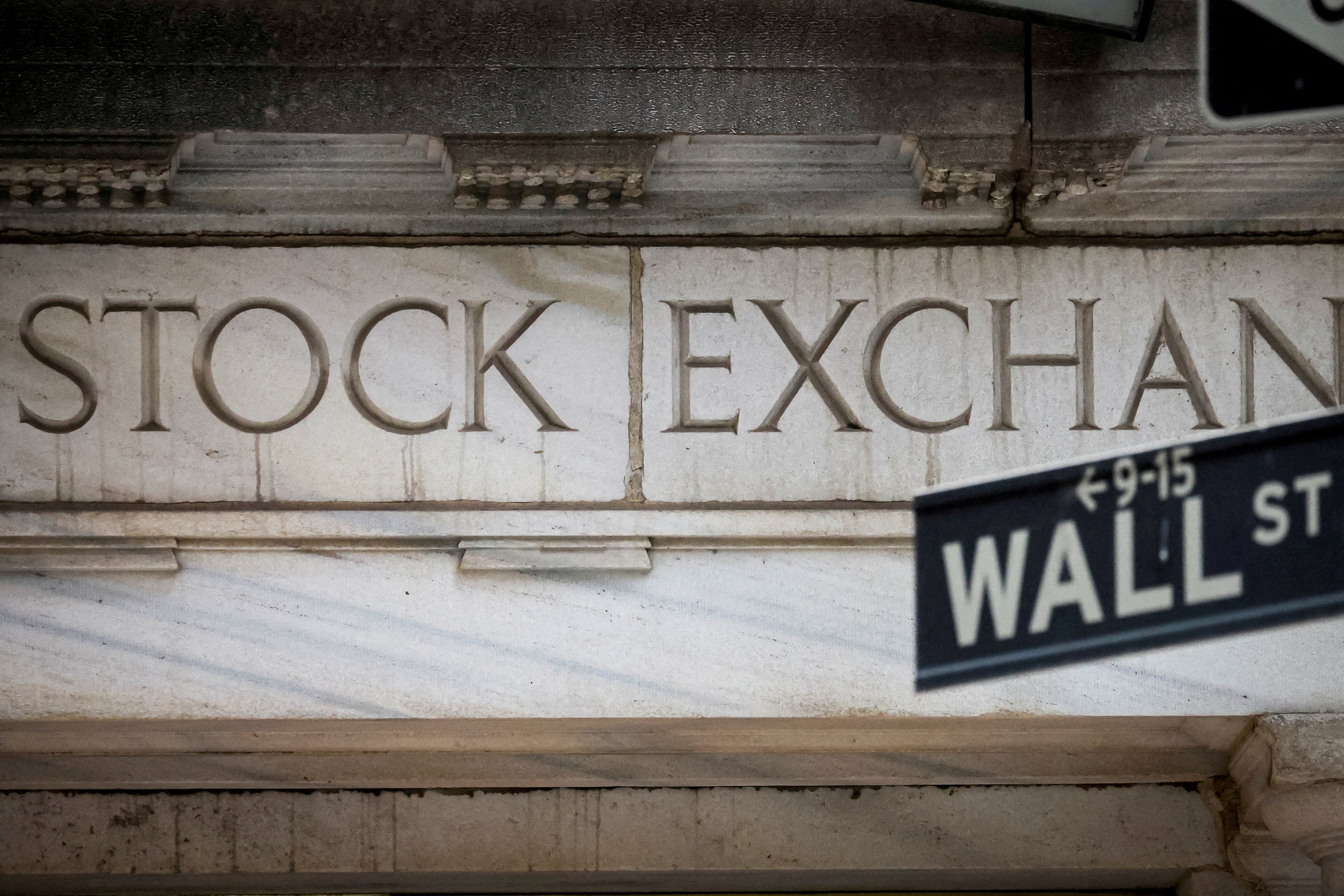 The Wall Street entrance to the New York Stock Exchange is seen in New York City on November 15, 2022. With its aggressive interest rate hikes, the Fed has opened a Pandora’s box of contagion risks with viral uncertainty spilling over into several banks, reminiscent of the mood of 2008. Photo: Reuters 