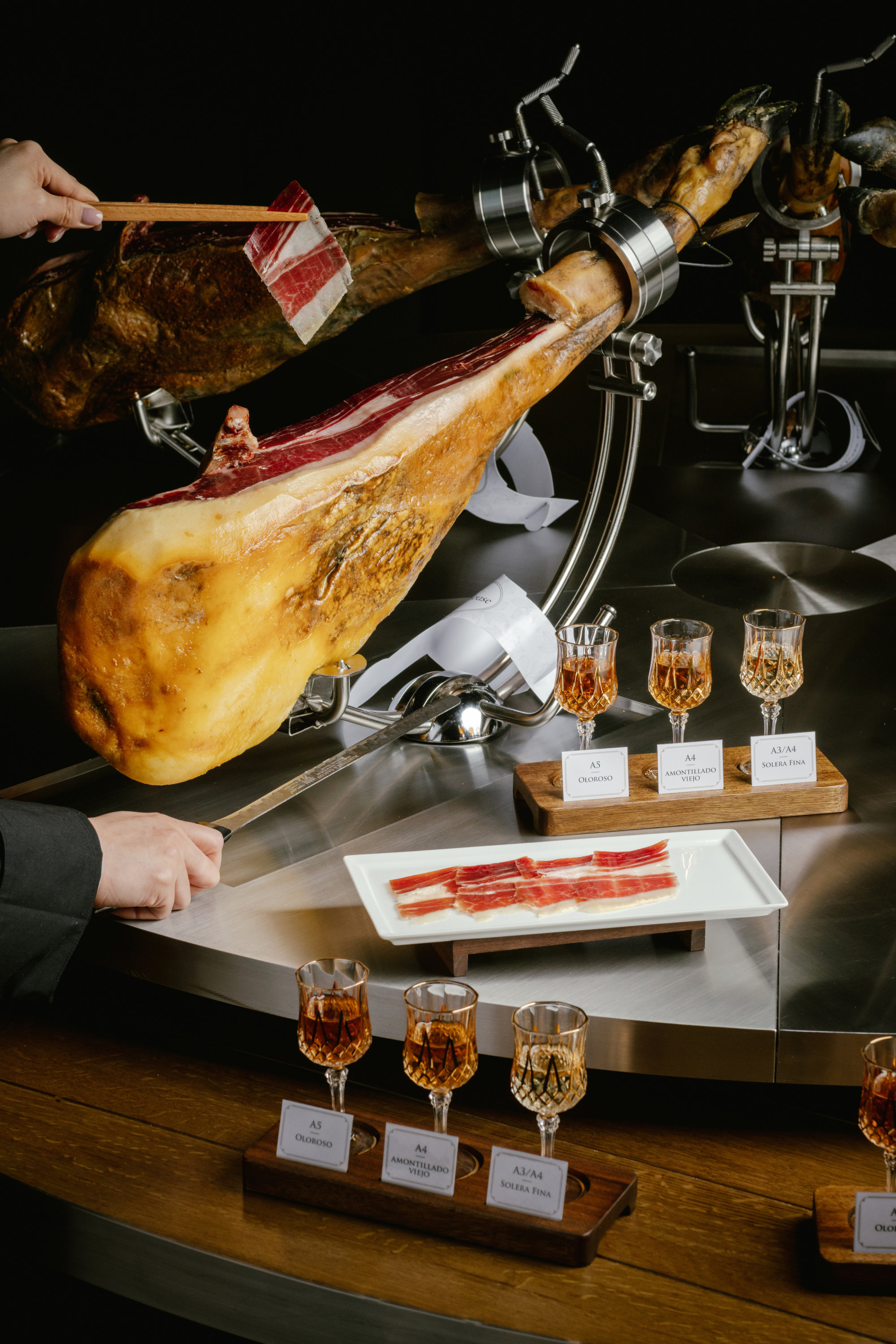 tapas-and-a-taste-smell-and-view-of-cured-iberico-hams-on-a-tour-of