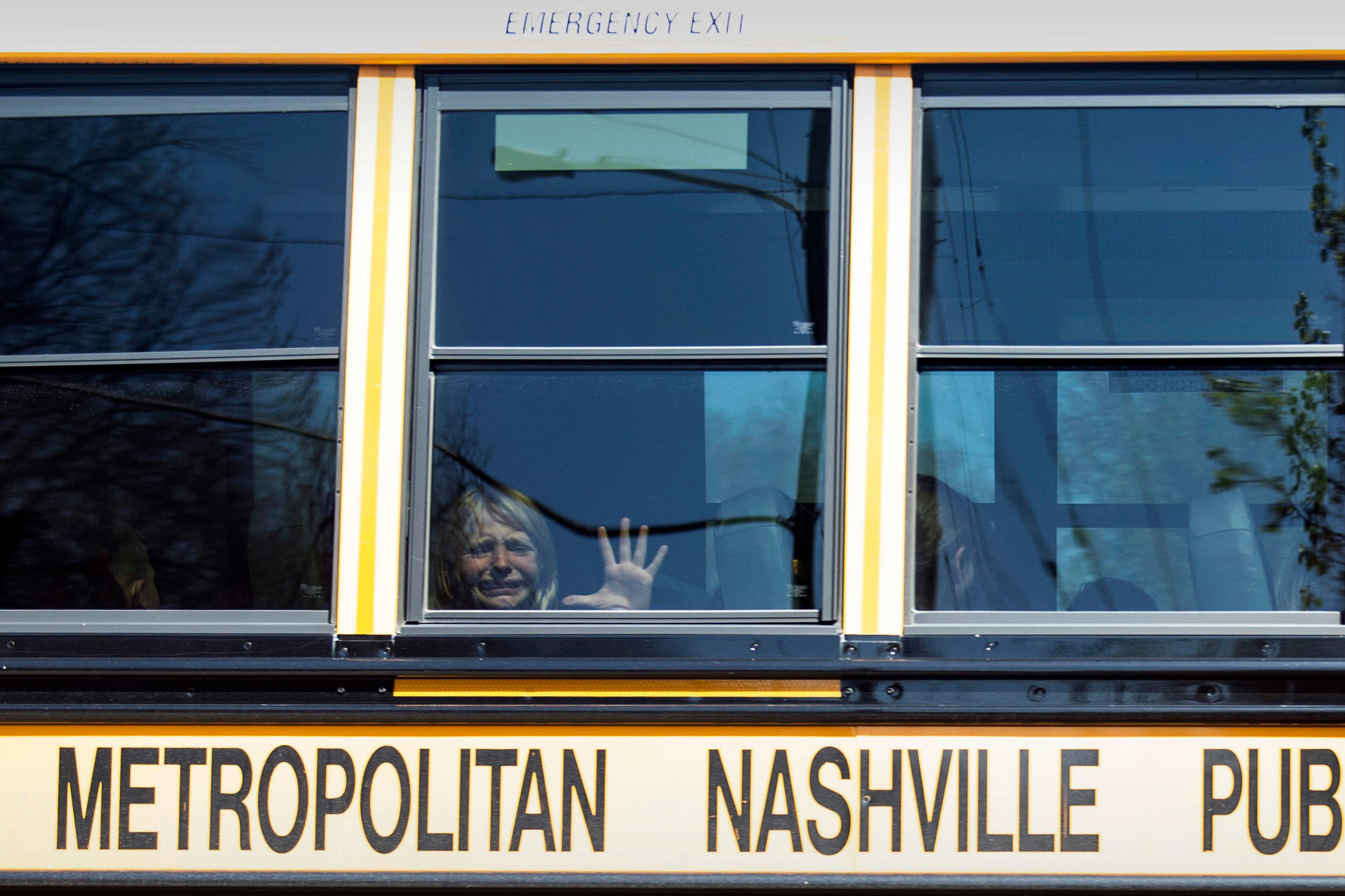 A child weeps leaving The Covenant School on a bus, following the mass shooting. Photo: The Tennessean via Reuters