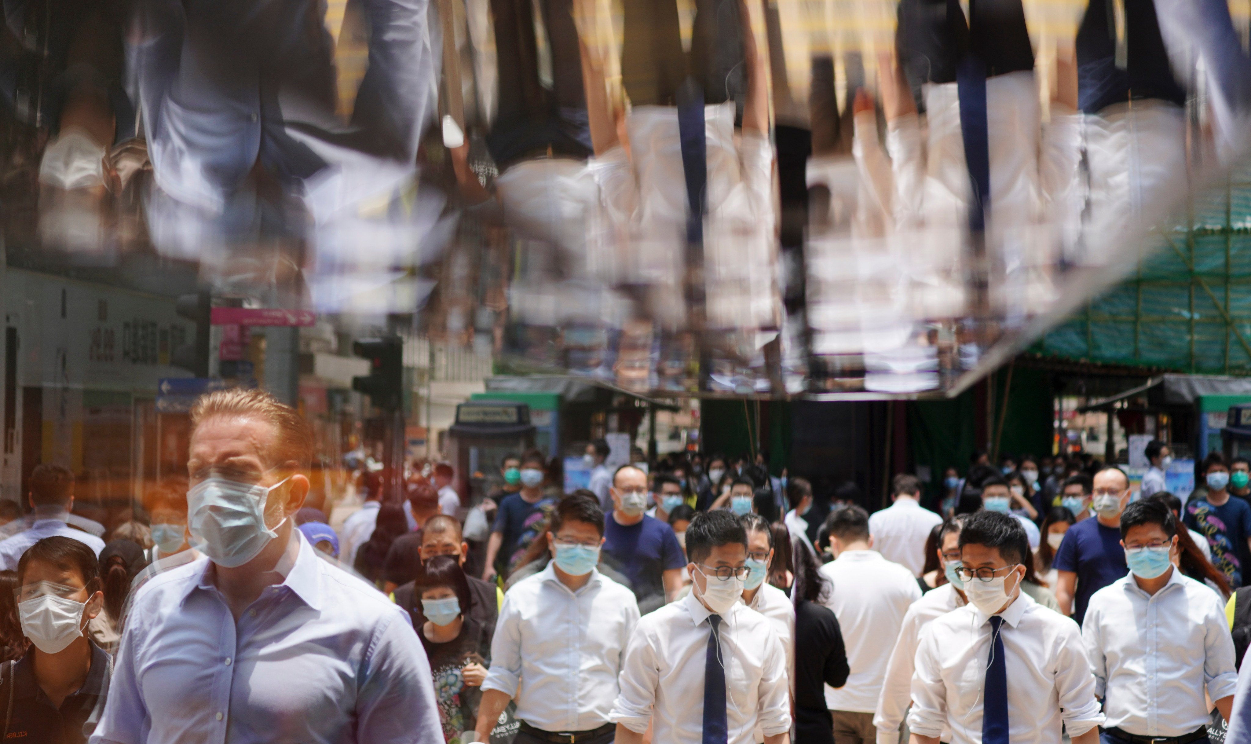 People across the street during lunch time in Central in May 2020. Hong Kong’s talent scheme has so far mostly attracted other Chinese people. Photo: Sam Tsang