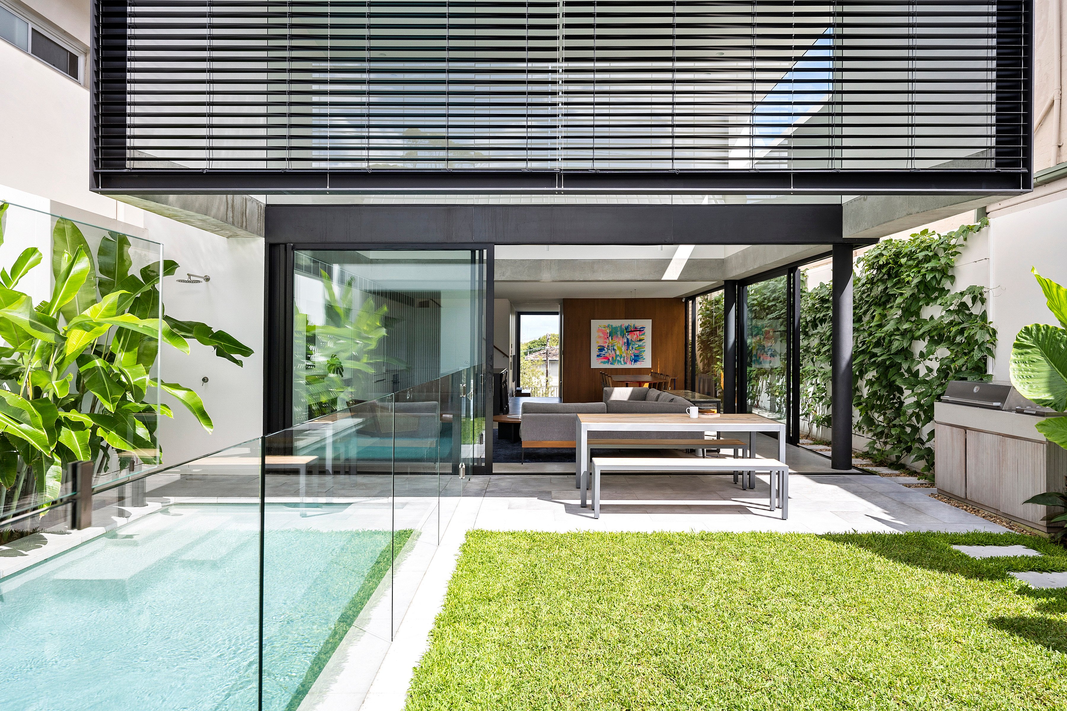 The garden and living room of a family home in Queens Park, Sydney, Australia. The house was designed from the ground up for the Olah family, who relocated from Hong Kong. Photo: Desmond Chan