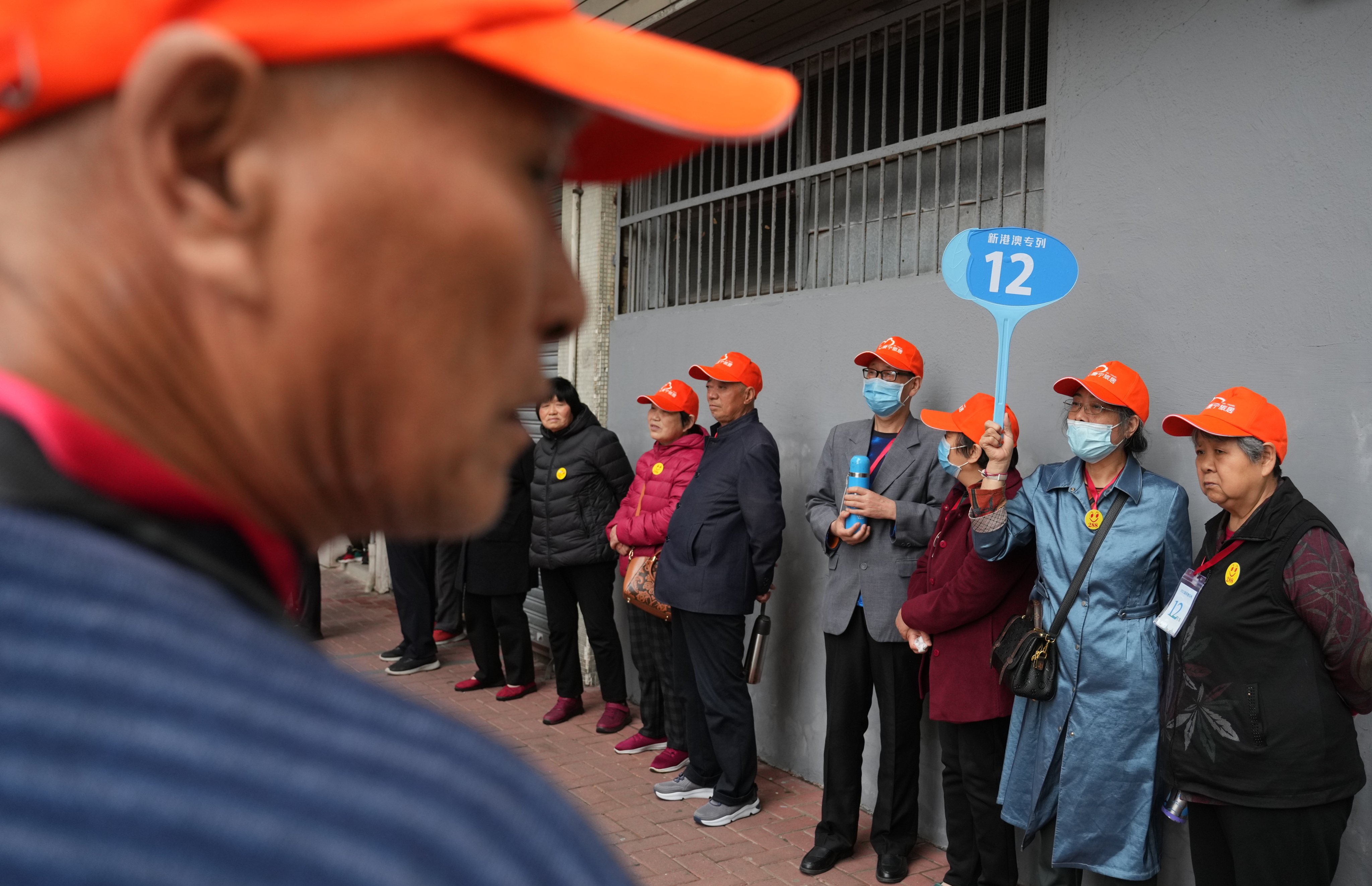 Dozens of mainland tourists lining up outside Foo Yuen Chinese Restaurant on March 27. Photo: Sam Tsang