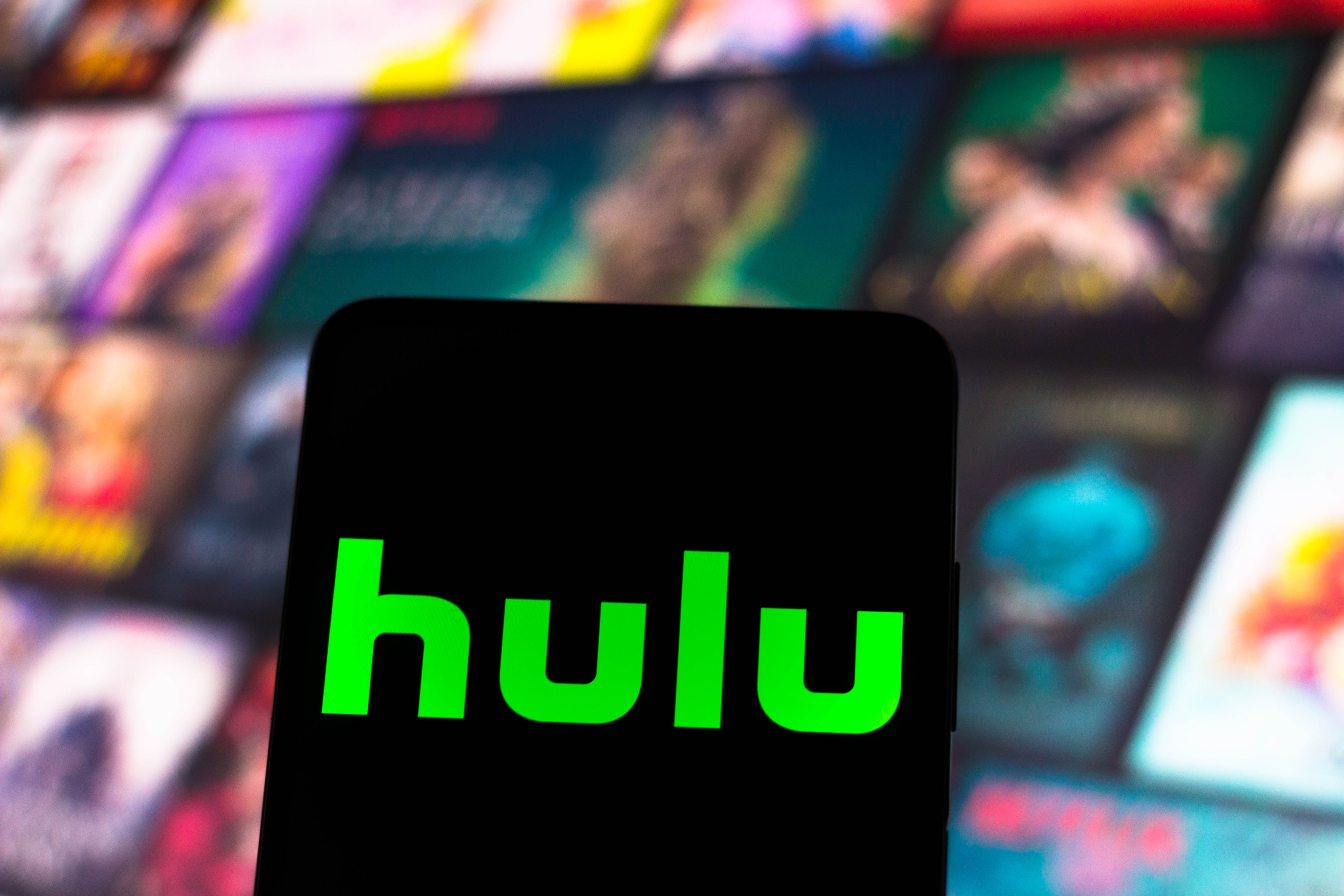The Hulu logo is seen displayed on a smartphone screen.  Photo: Shutterstock