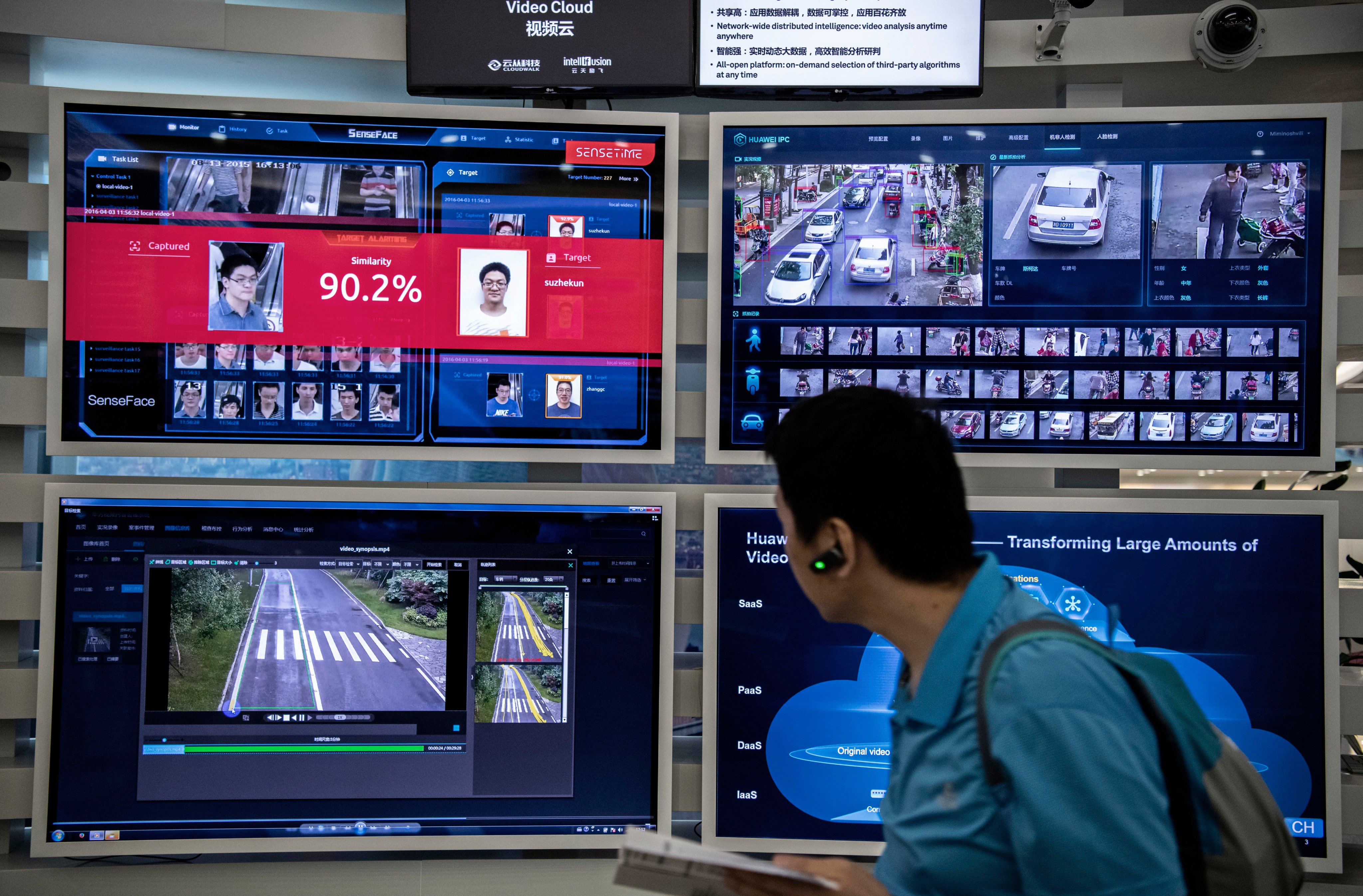 A display showing AI-driven facial recognition software in action is seen in Shenzhen, China. Photo: Getty Images 