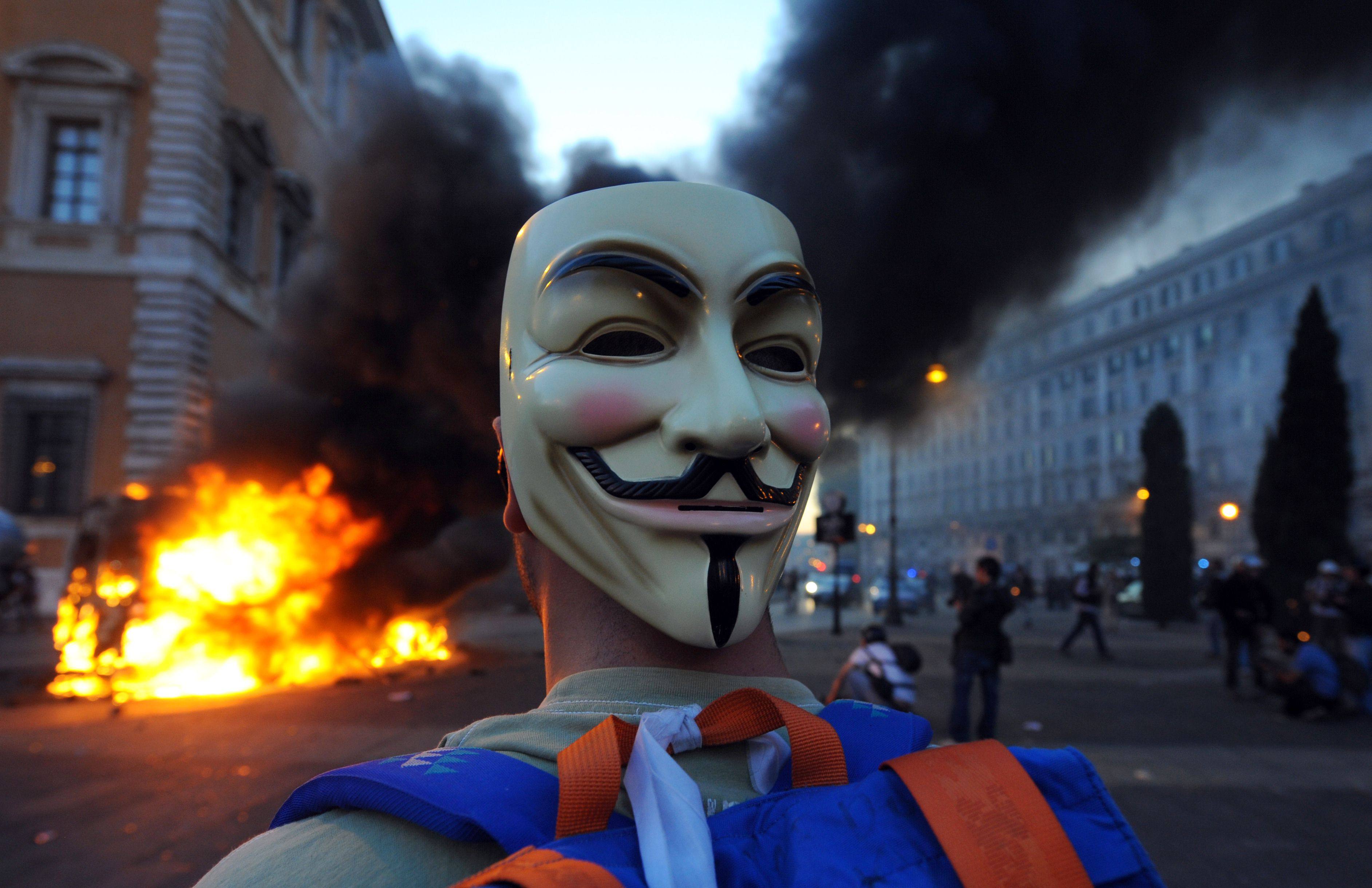 A masked protester at a protest in Rome on October 15, 2011, against the greed of bankers, in what was the worst violence of worldwide demonstrations against corporate greed in the aftermath of the global financial crisis. Photo: AFP