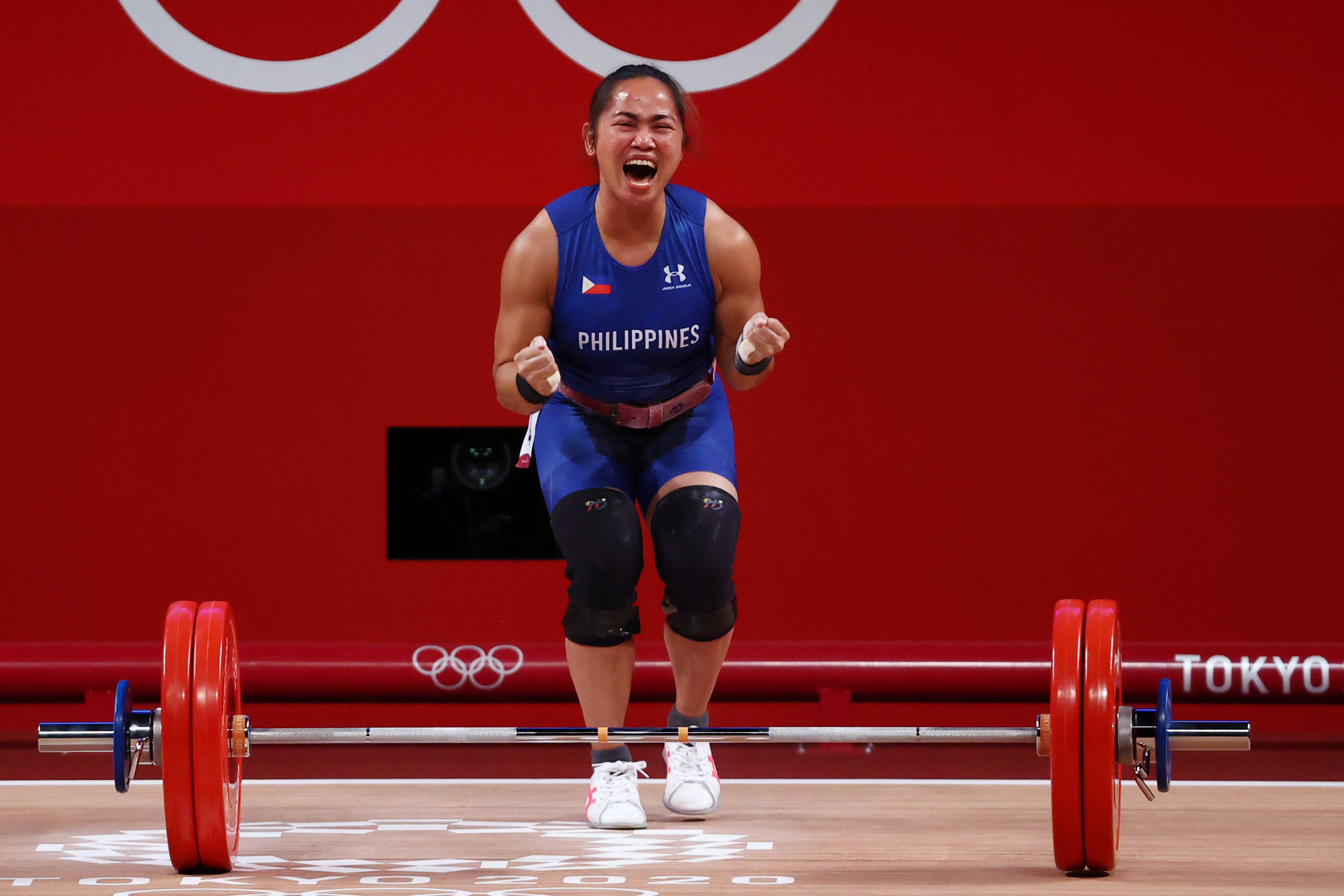 Hidilyn Diaz of the Philippines celebrates after a lift at the Tokyo Olympics in 2021. Photo: Reuters