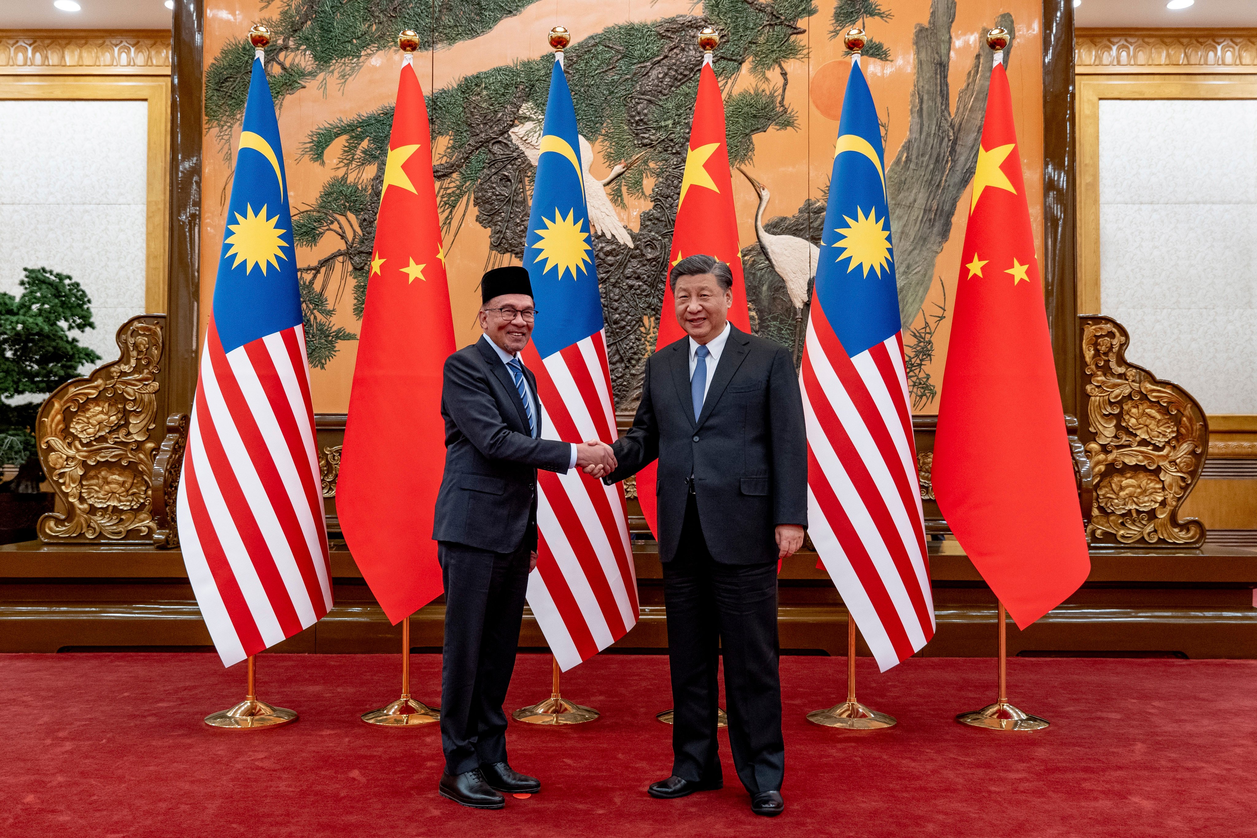 Malaysian Prime Minister Anwar Ibrahim (left) meets  Chinese President Xi Jinping at the Great Hall of the People in Beijing on Friday. Photo: Prime Minister’s Office of Malaysia via AP