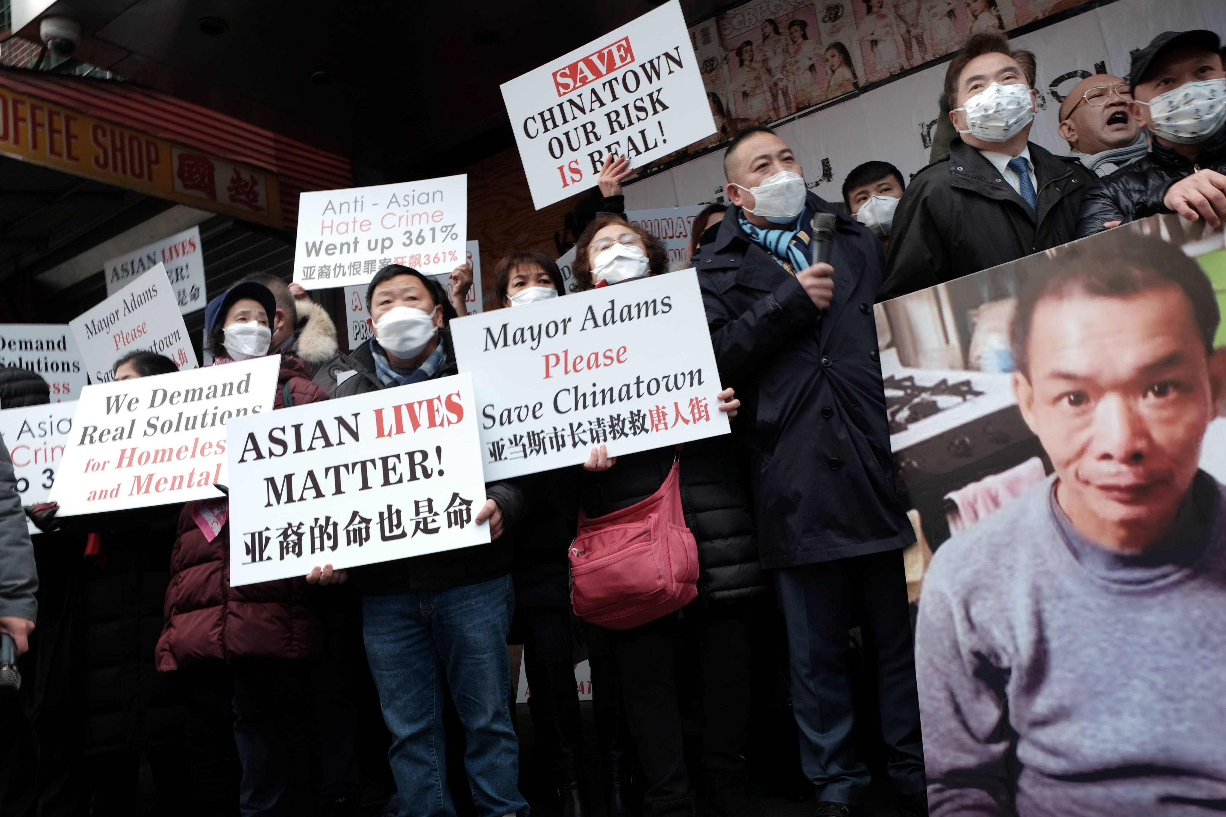 Residents join community and business leaders in January 2022 for a rally in Chinatown to denounce recent acts of violence against Asian-Americans in New York. Photo: AFP