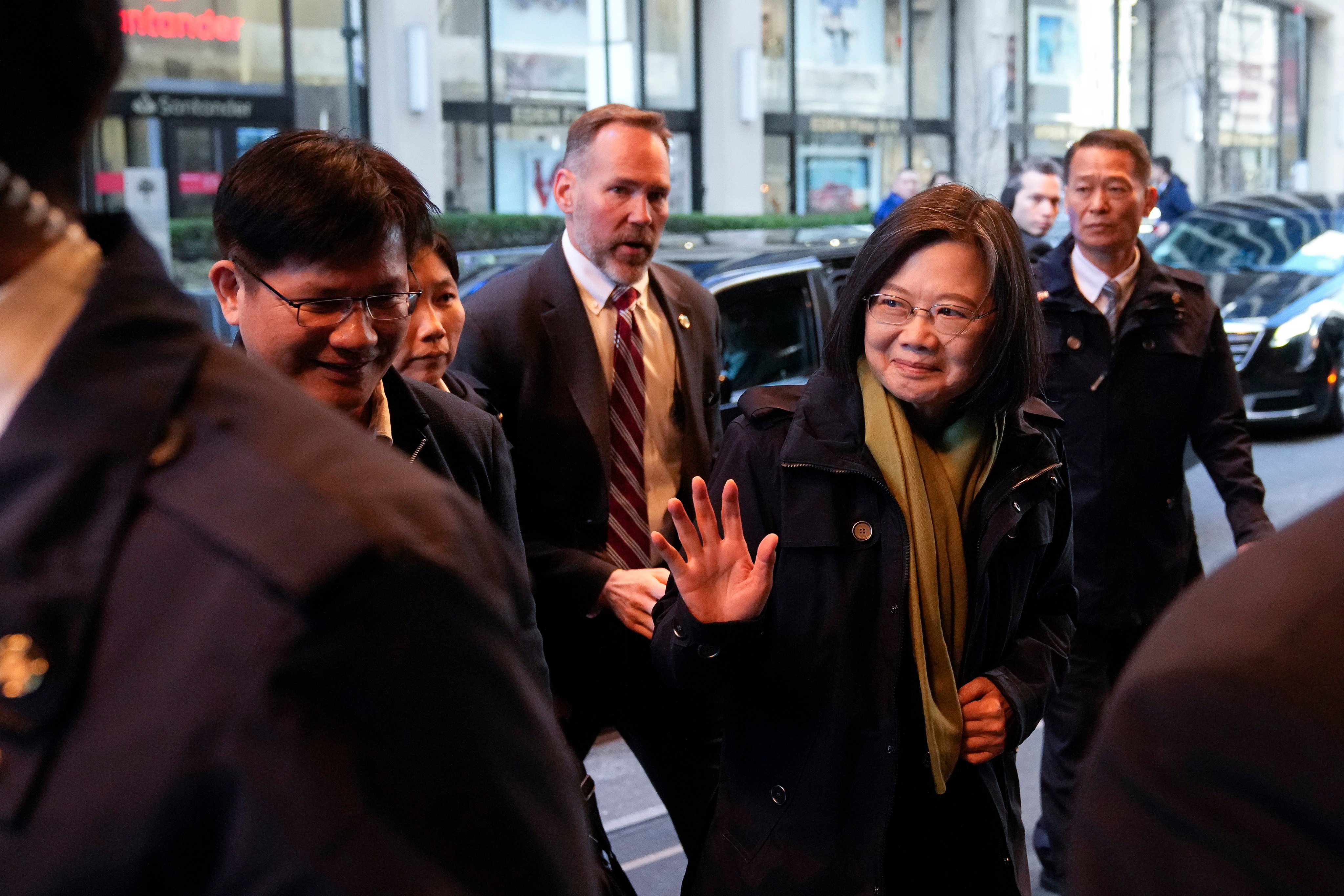 Taiwanese President Tsai Ing-wen waves as she arrives at a hotel in New York on March 30, a day before flying to Central America. Photo: AP 