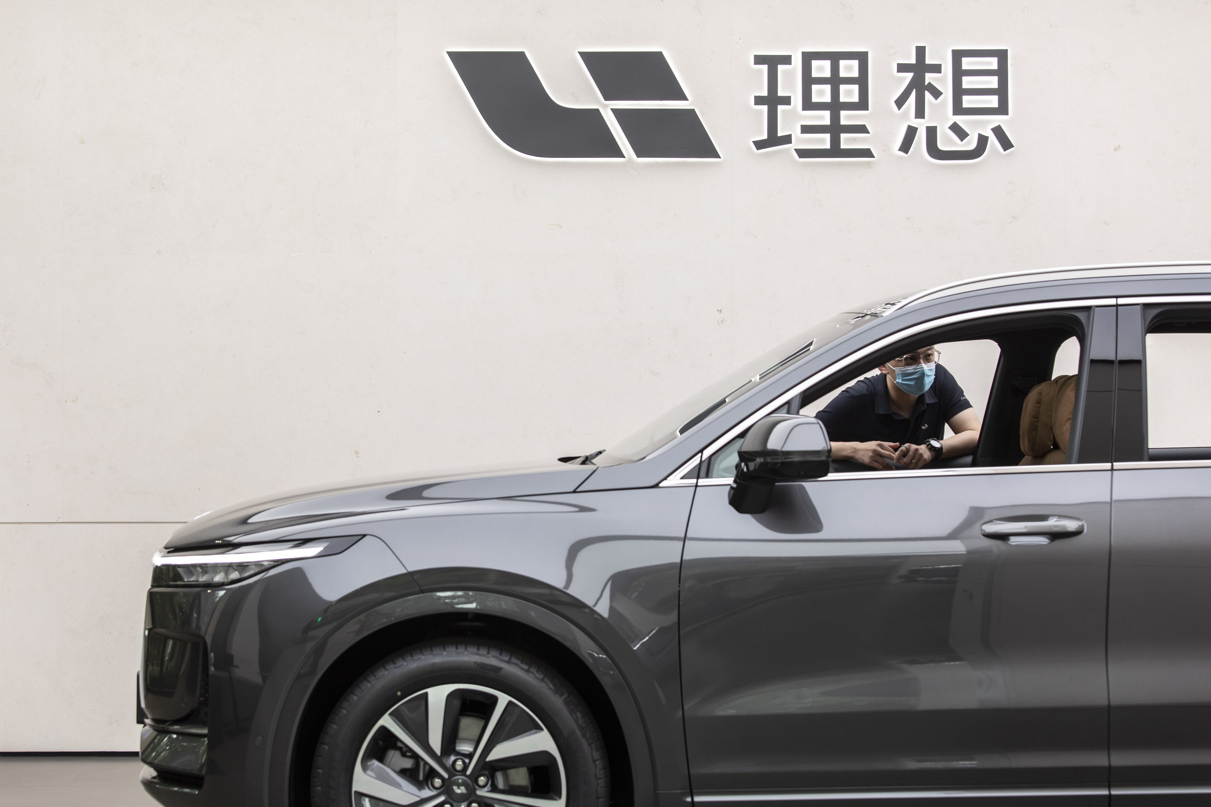 A Li One electric SUV on display at its showroom in Shanghai. The carmaker has emerged as Tesla’s nearest challenger buoyed by strong sales of its EVs. Photo: Bloomberg
