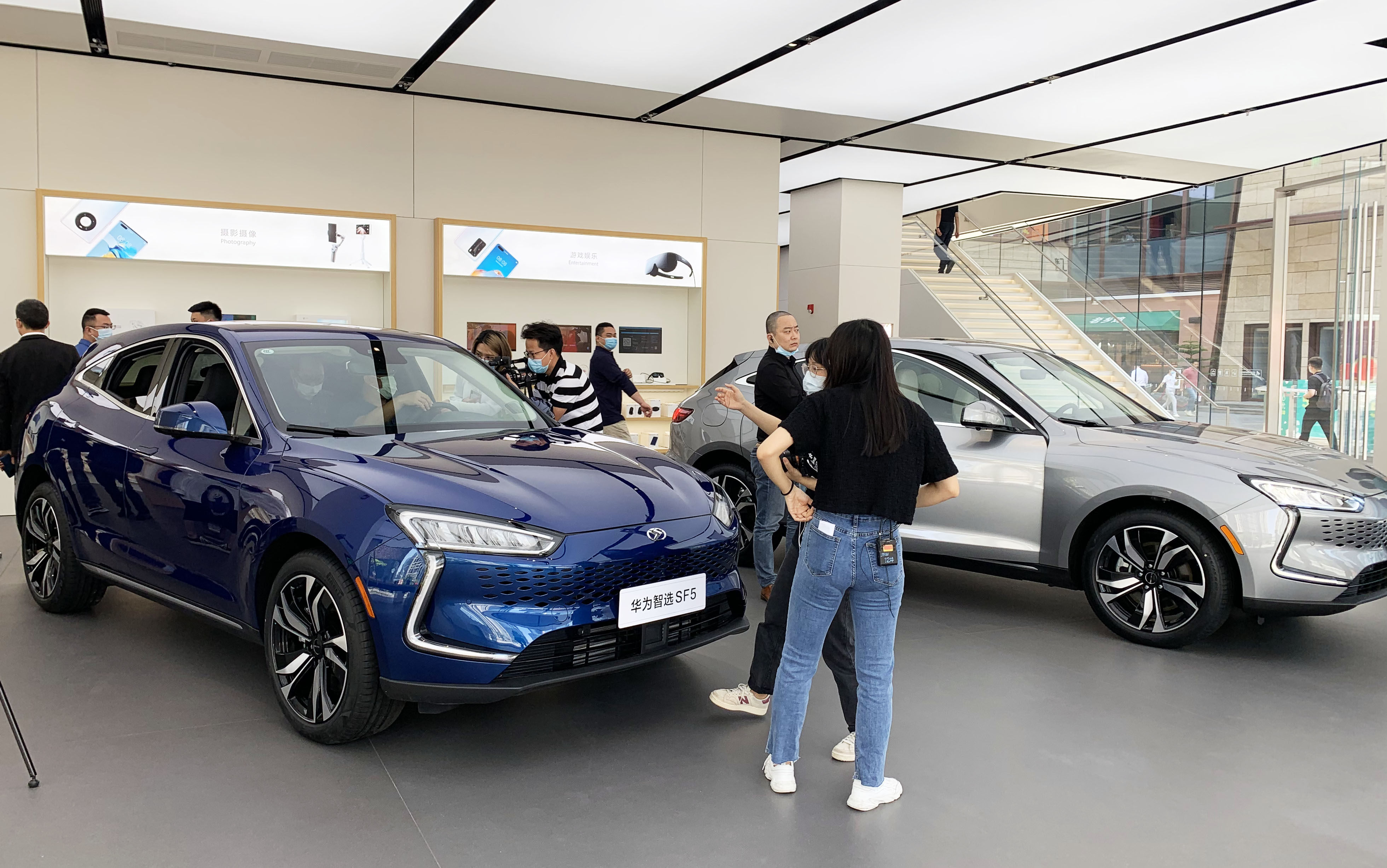 Chinese telecommunications equipment maker Huawei Technologies  Co sells electric vehicles at its flagship store in Shenzhen on April 21, 2021. Photo: SCMP