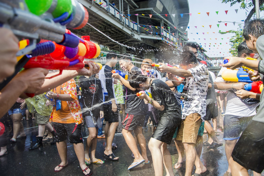 Thailand’s Songkran marks the Thai New Year, and a family ritual of pouring water over others has evolved into mass water fights on the streets of cities such as Bangkok. Photo: Shutterstock
