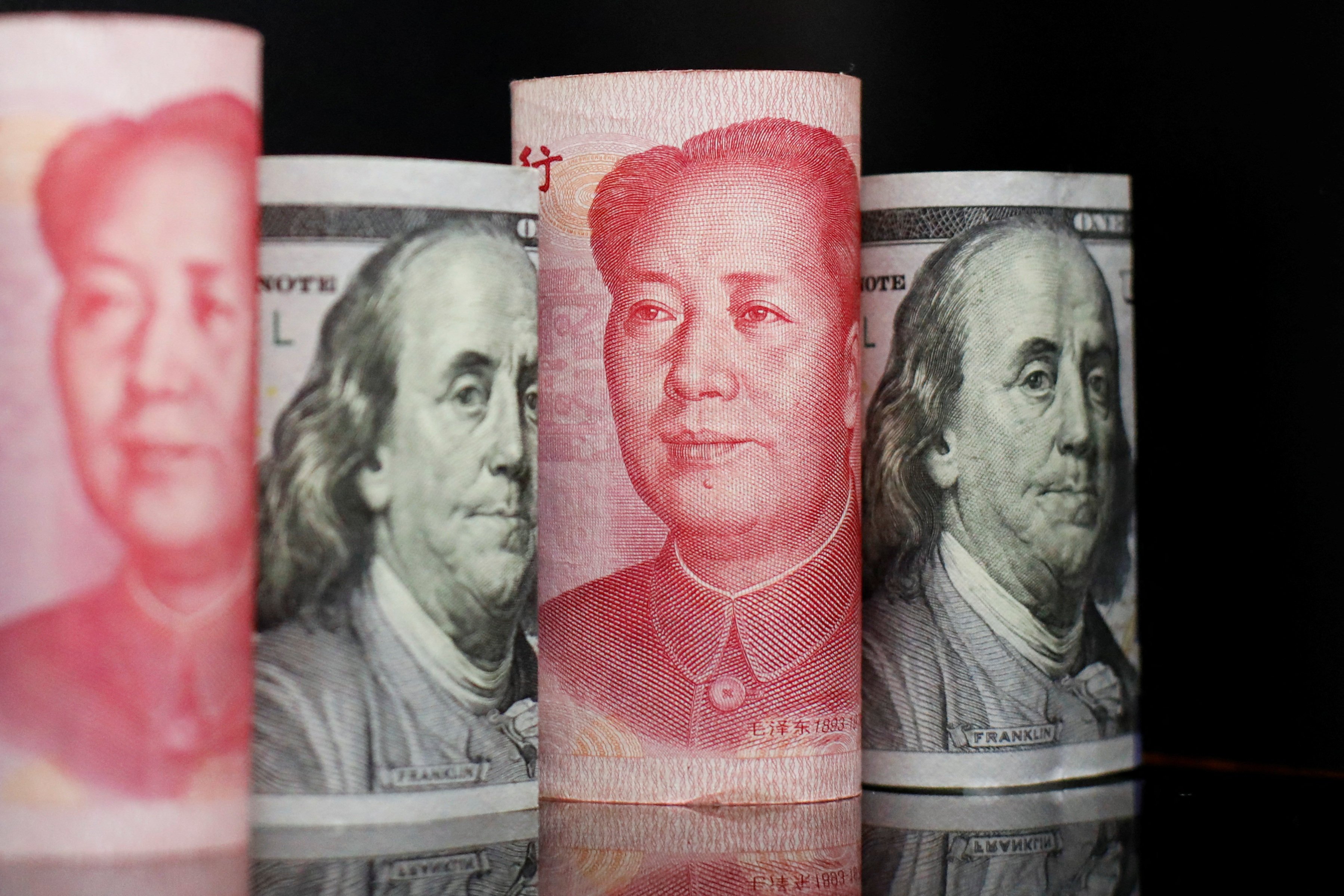 Banknotes of Chinese yuan and US dollar are seen in this illustration picture taken in 2022. Photo: Reuters