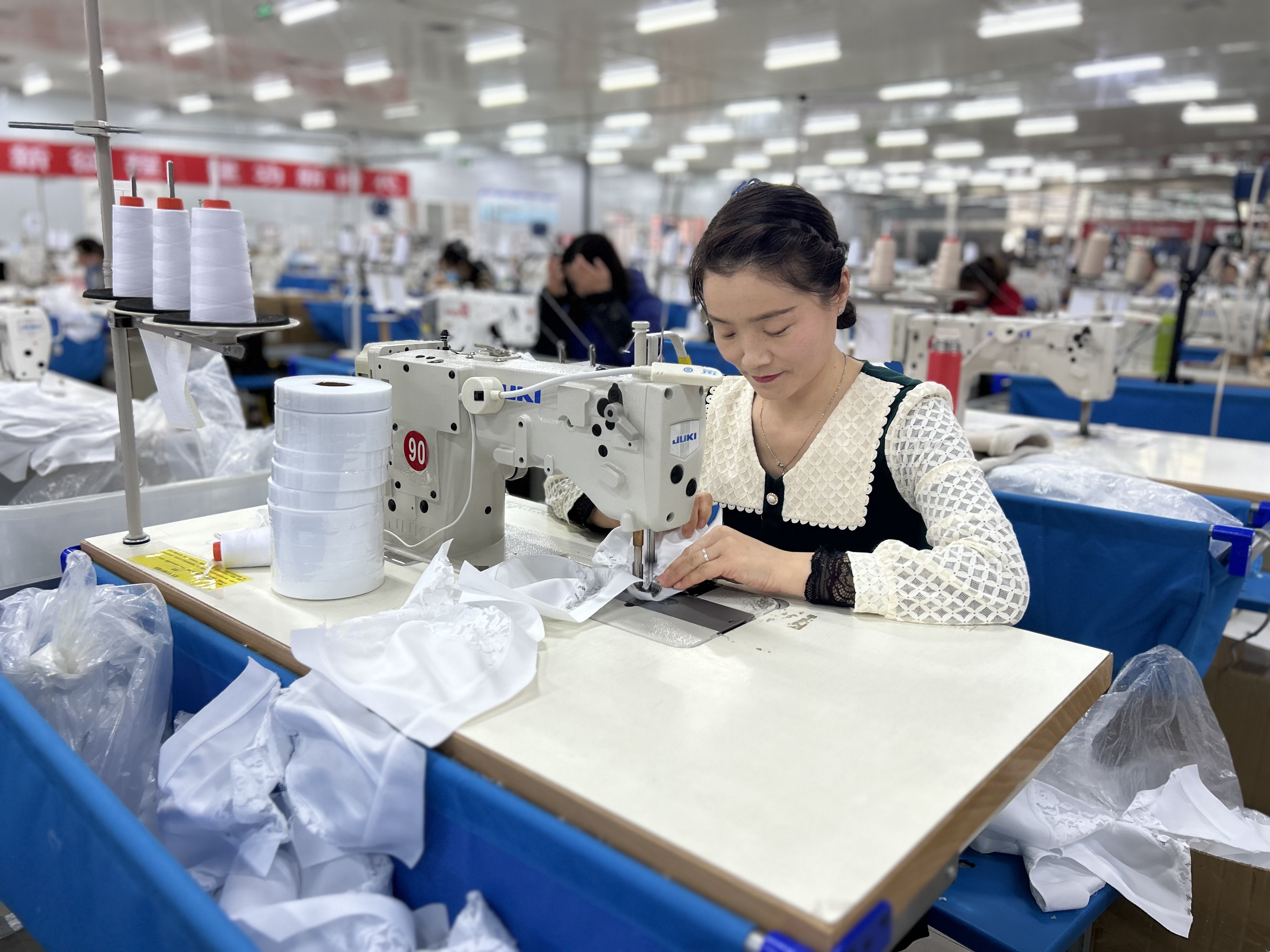A worker sews at a factory in China’s Ningxia Hui autonomous region. Business-registration data shows that small and micro-sized firms are making a comeback across the country. Photo: Xinhua