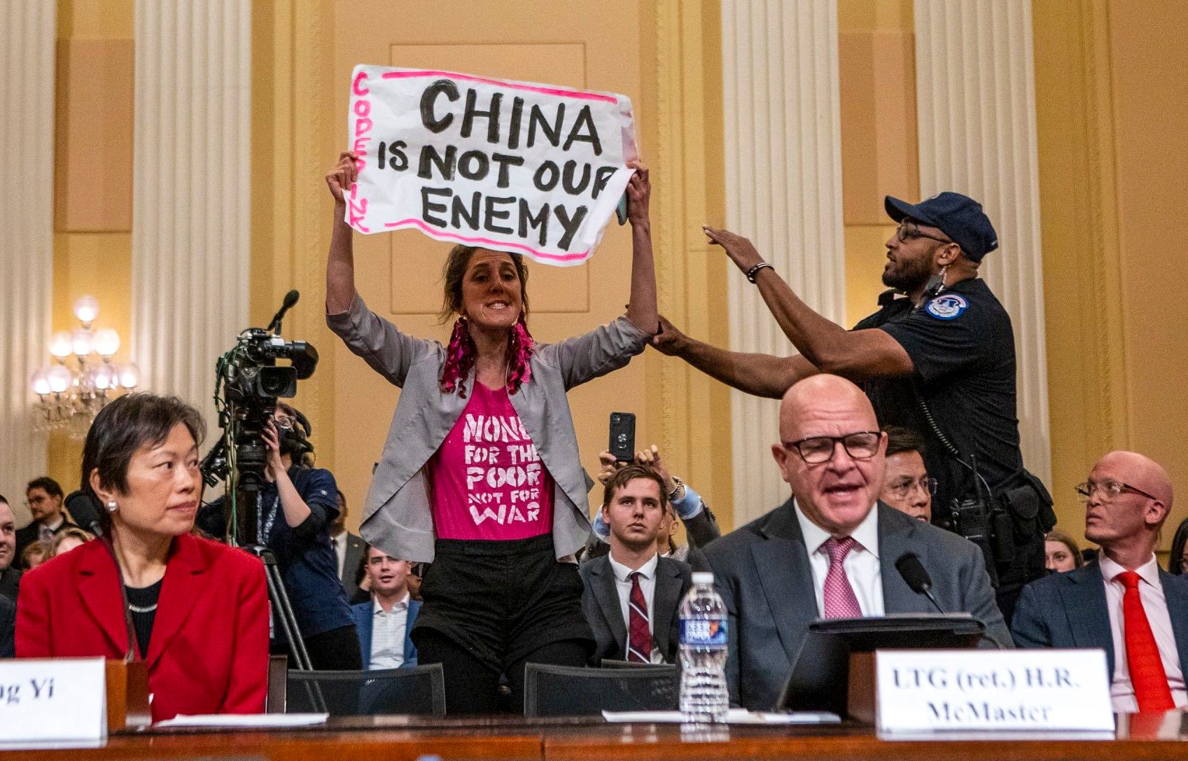 A demonstrator interrupts witness testimony during a hearing of the House Select Committee on the Strategic Competition Between the United States and the Chinese Communist Party, in Washington on February 28. Photo: Bloomberg