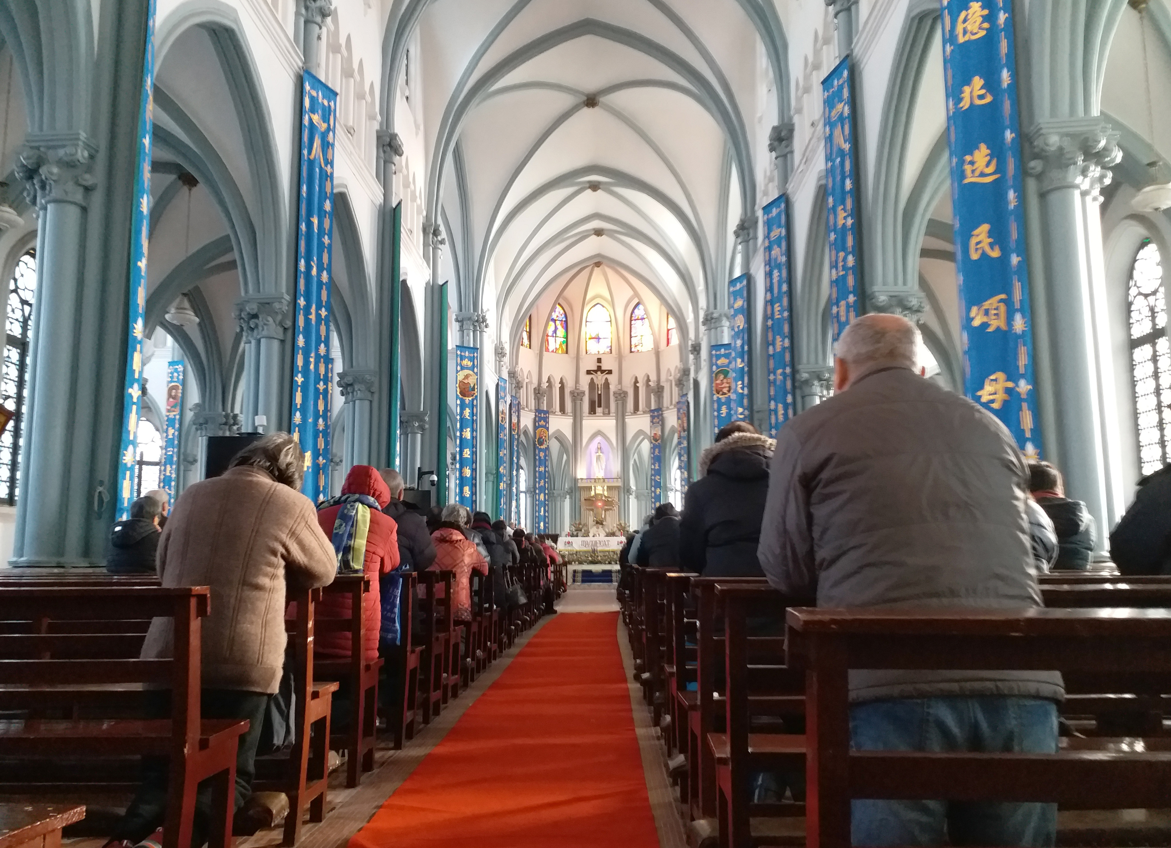 Worshippers are seen at a Catholic church in Shanghai in February 2018. Photo: Mimi Lau