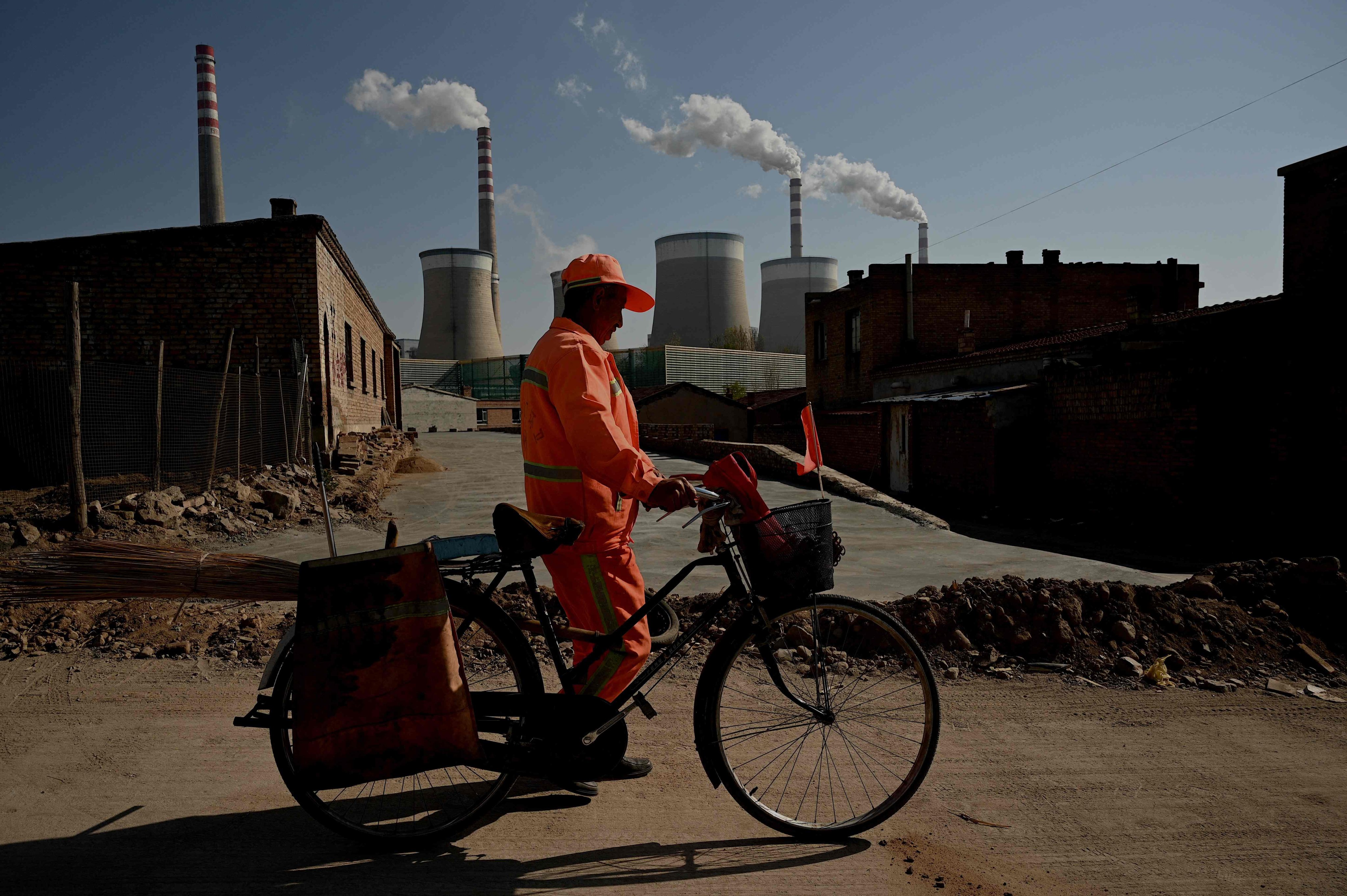 A coal power station belches smoke in Datong, China’s northern Shanxi province. China has accelerated plans to build new coal plants. Photo: AFP