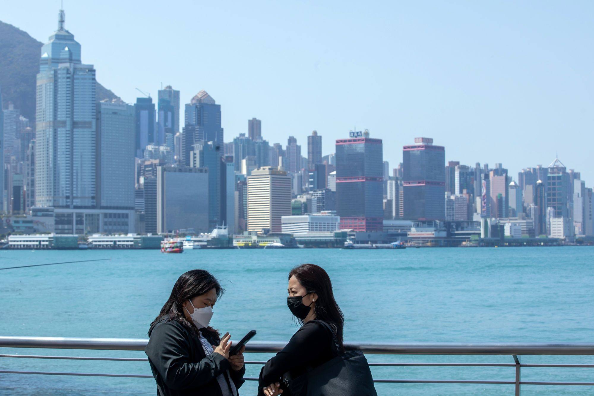 A view of office buildings from the Tsim Sha Tsui promenade in Kowloon on February 28. In the world’s leading global financial centres, the vast majority of offices which house financiers and professional services are highly agglomerated. Photo: Bloomberg