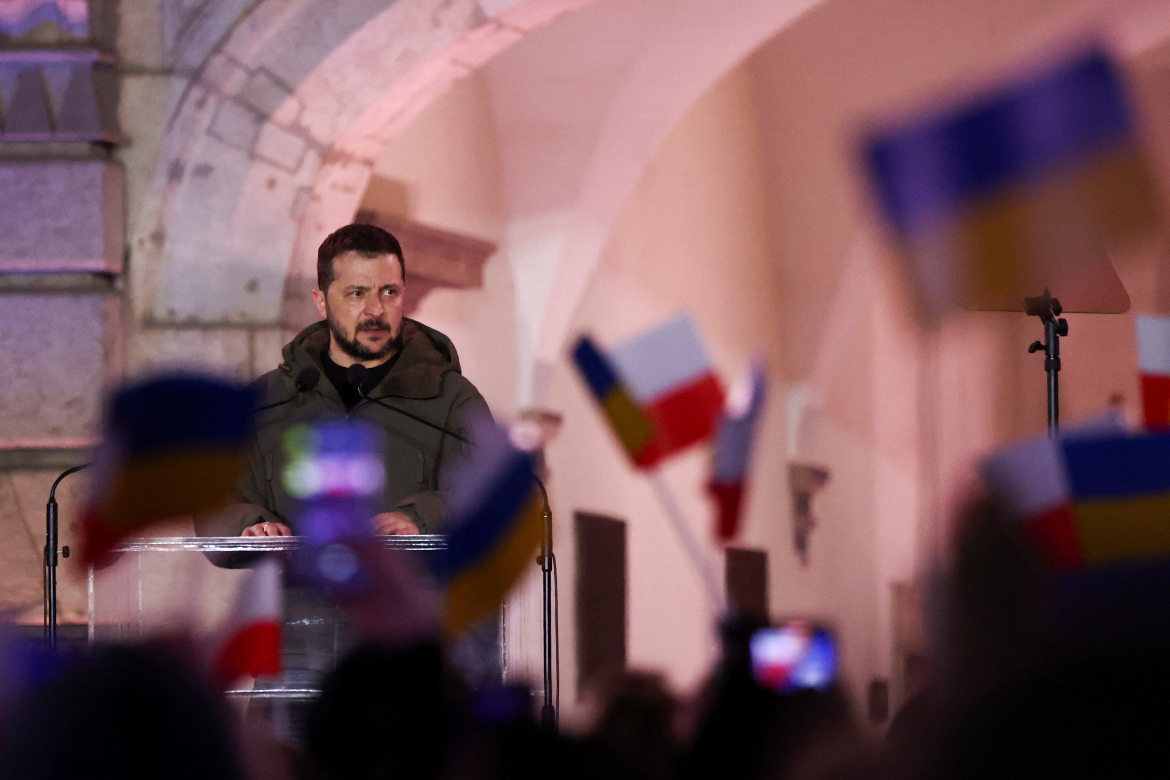 Ukrainian President Volodymyr Zelensky speaks at the Royal Castle courtyard as he visits Warsaw, Poland on Wednesday. Photo: Reuters
