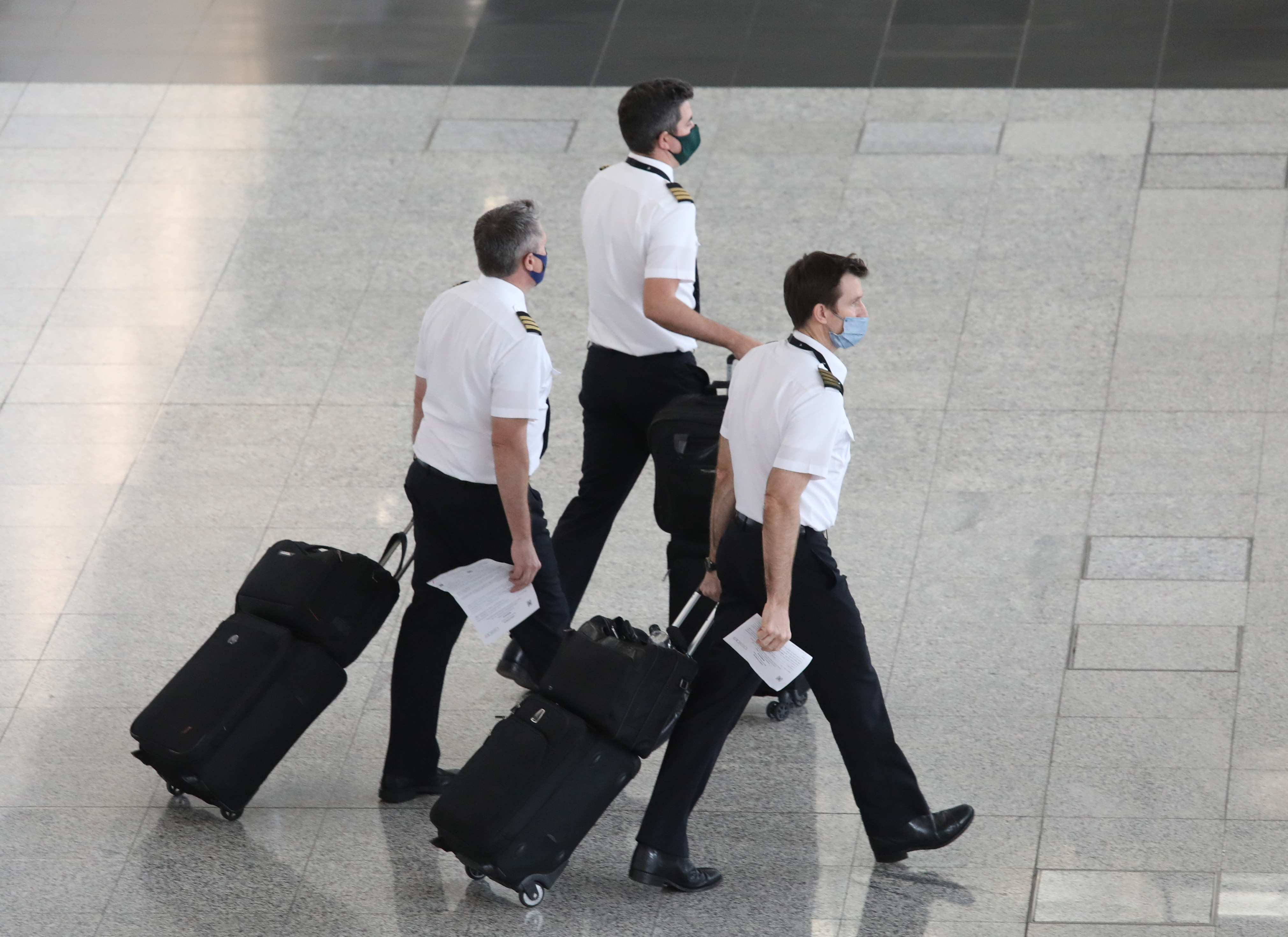 Pilots at the arrival hall in the Hong Kong International Airport. The new The initiative would mark the first close collaboration between Hong Kong and the mainland over training pilots. Photo: Yik Yeung-man