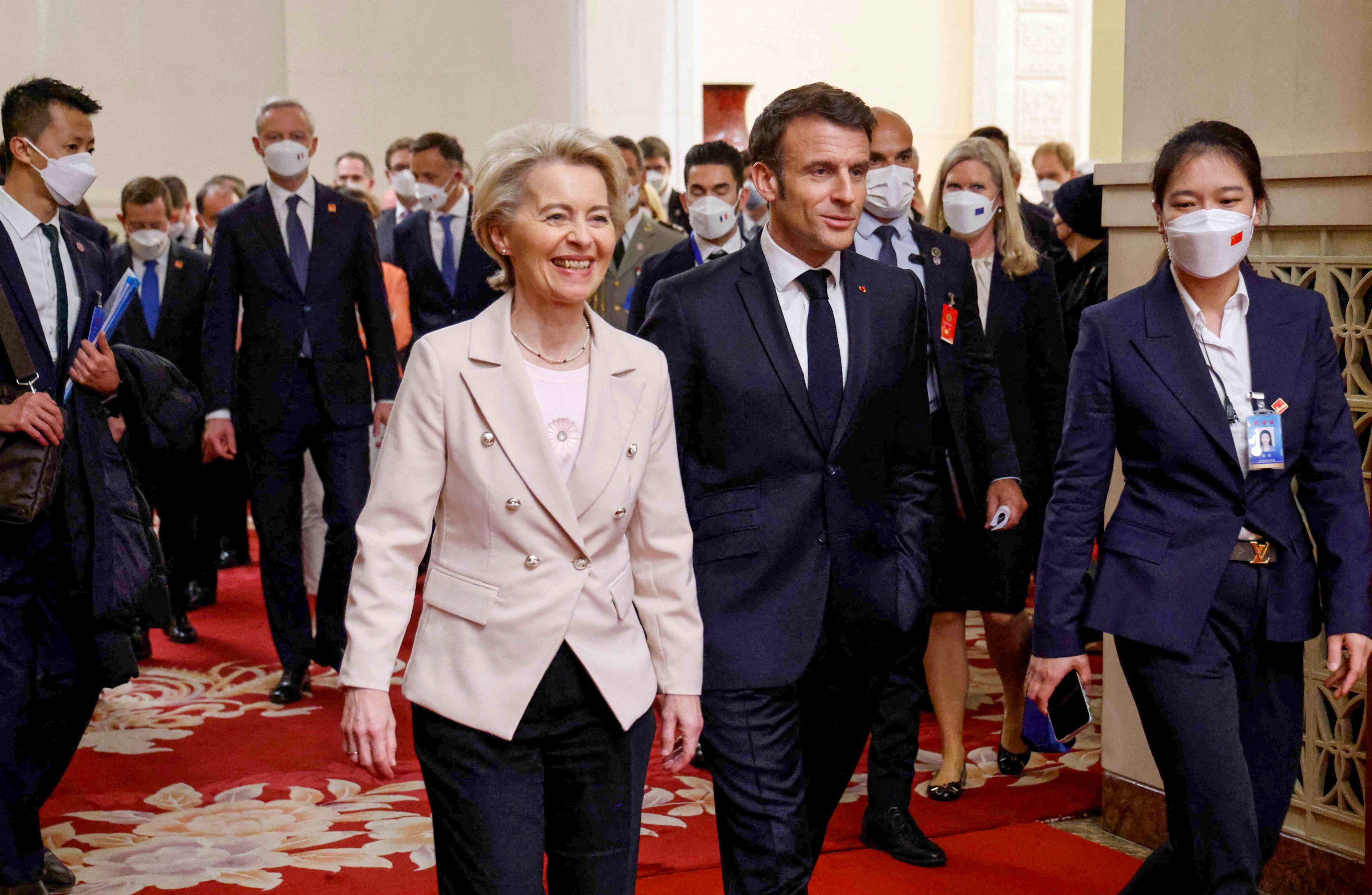 European Commission President Ursula von de Leyen (left) and French President Emmanuel Macron (centre) arrive for a meeting with Chinese President Xi Jinping in Beijing on Thursday. Photo: AFP