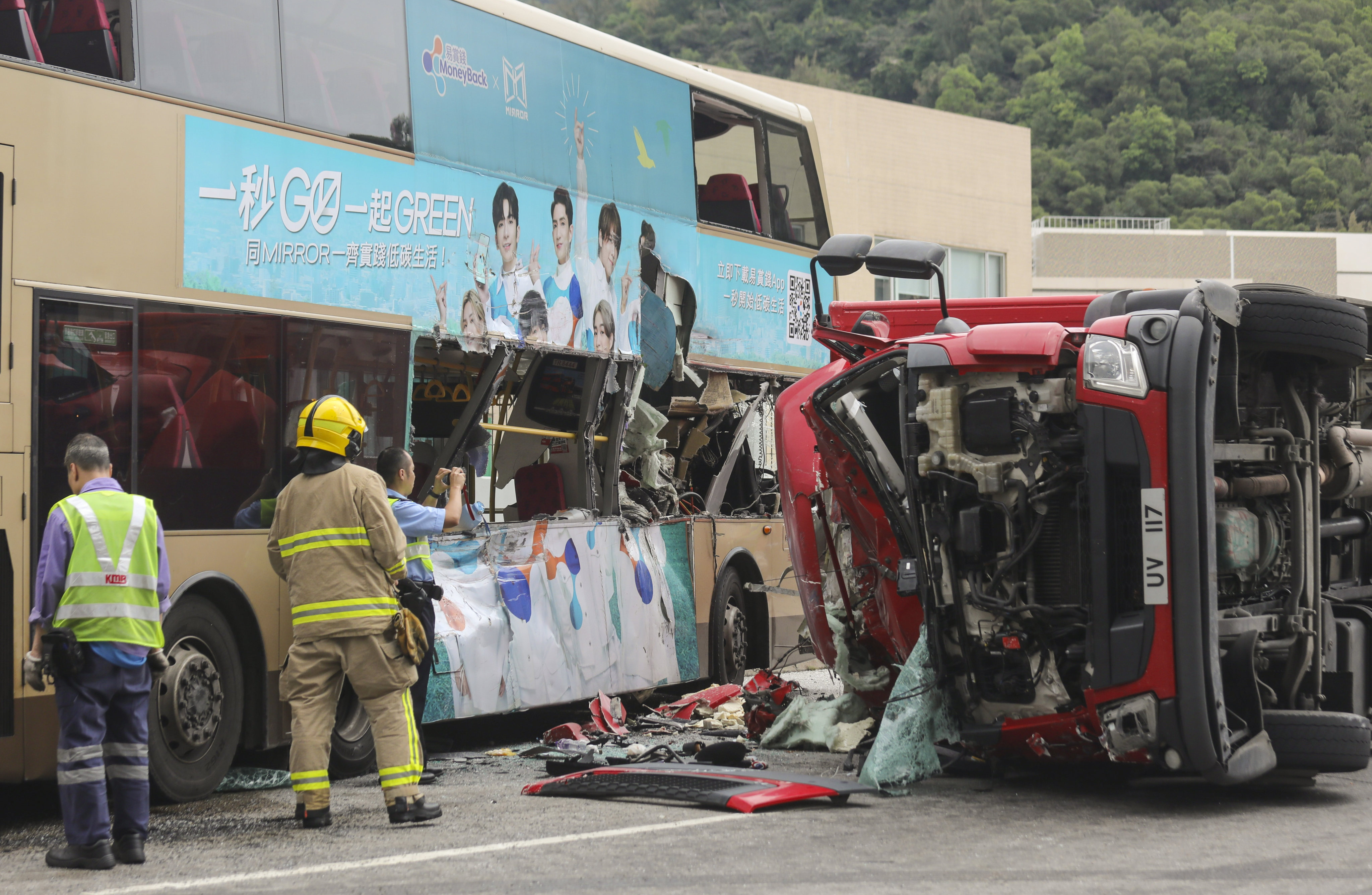 A truck collided with a bus and toppled onto its side in Tseung Kwan O Industrial Estate. Photo: Xiaomei Chen