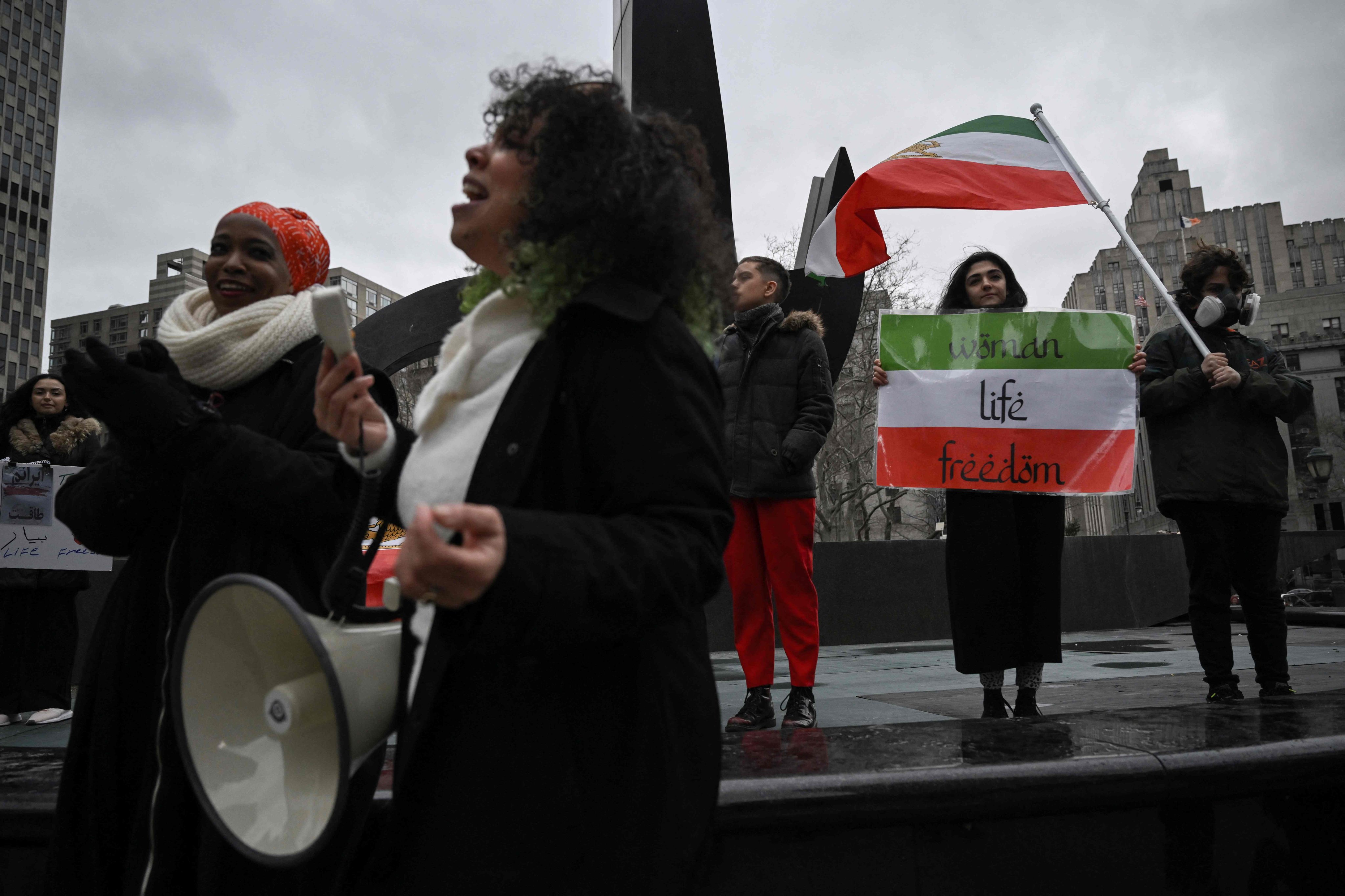 Activists from New York-based Iranian women’s rights group Woman Life Freedom attend a rally condemning the mass poisoning of Iranian female students, in New York, US on March 11. Photo: AFP